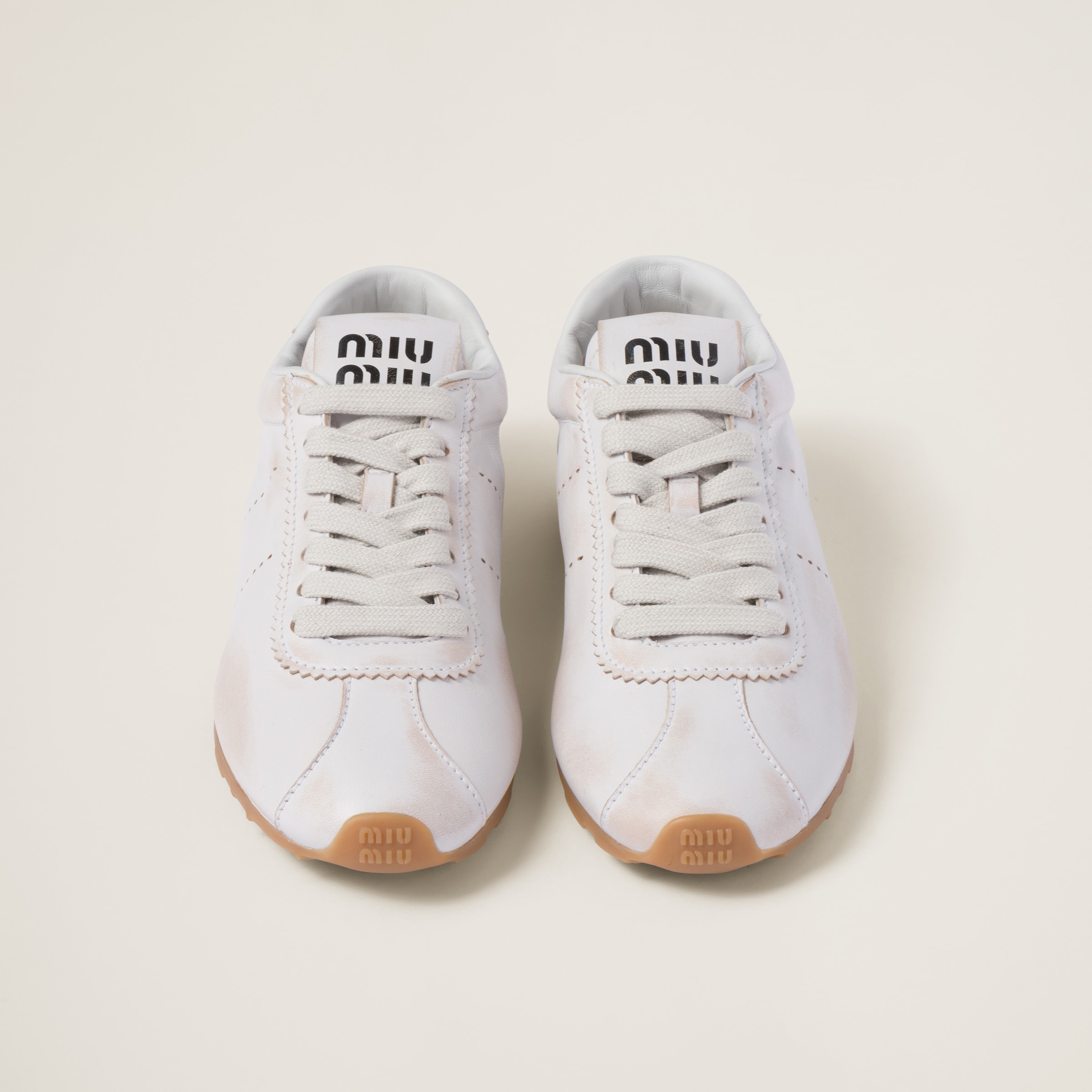 Shop Miumiu Bleached Nappa Leather Sneakers In White