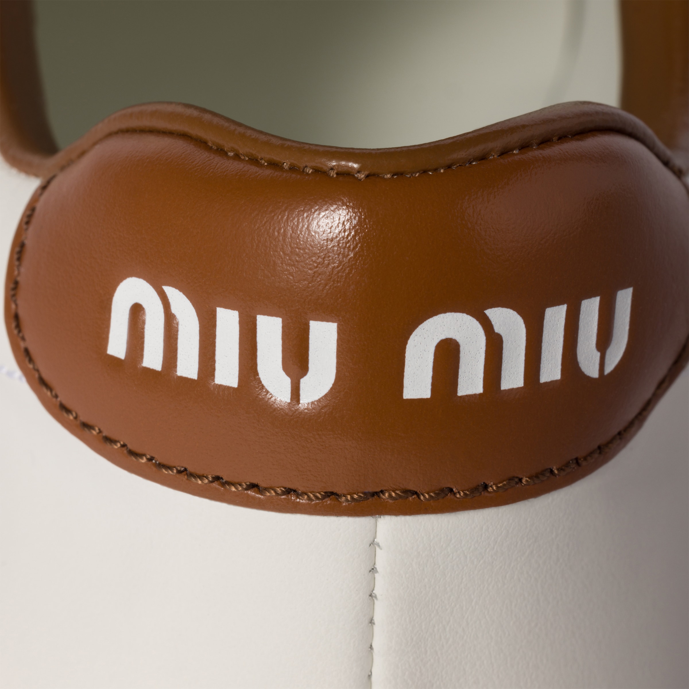 Miu Miu Leather Sneakers In White/cognac