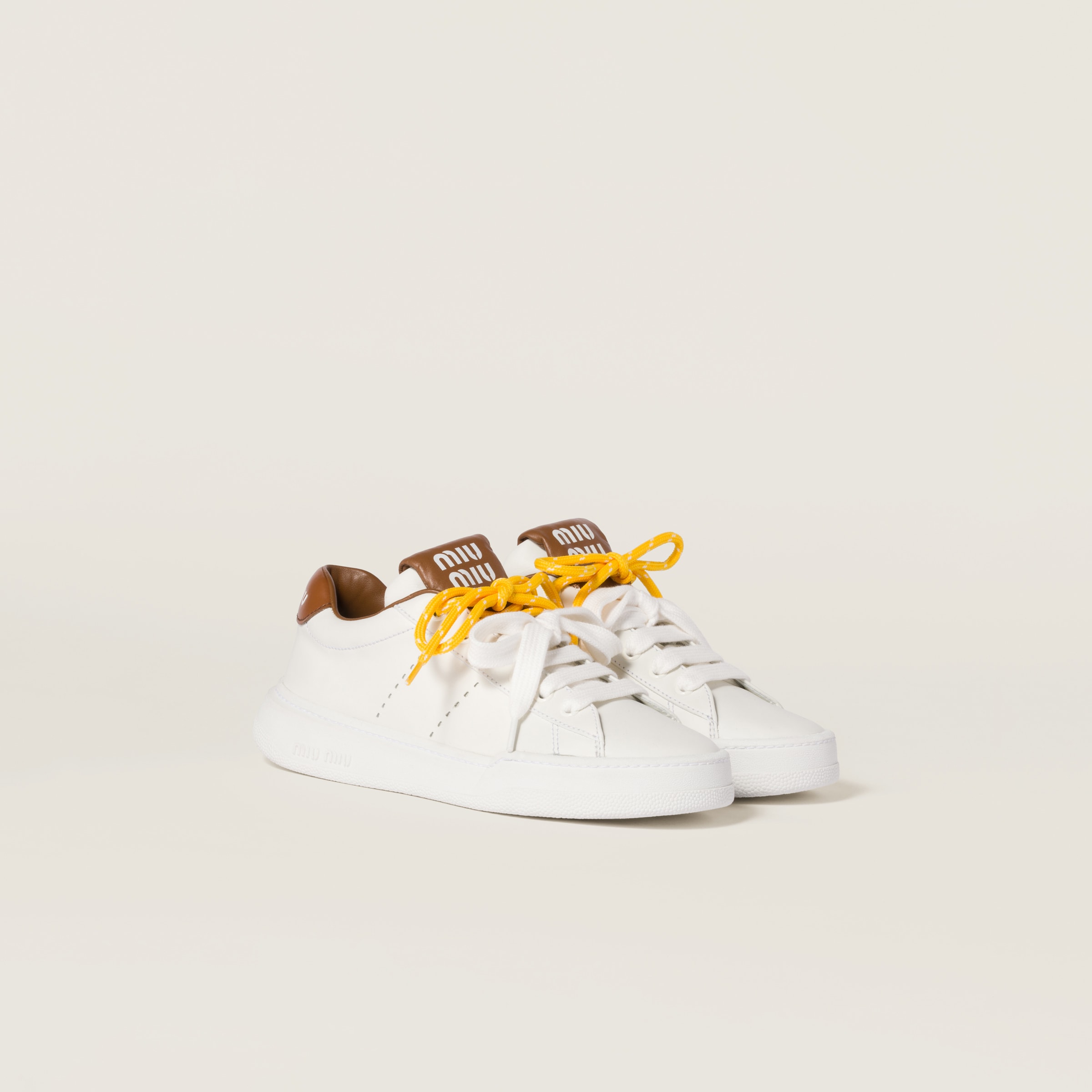 Miu Miu Leather Sneakers In White/cognac