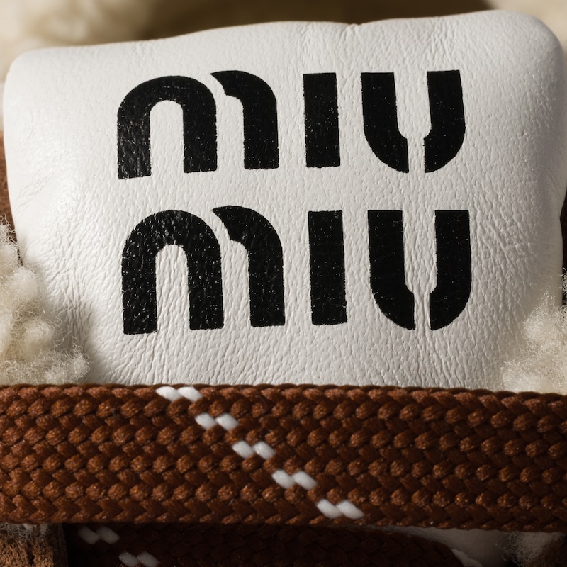 Suede and shearling sneakers