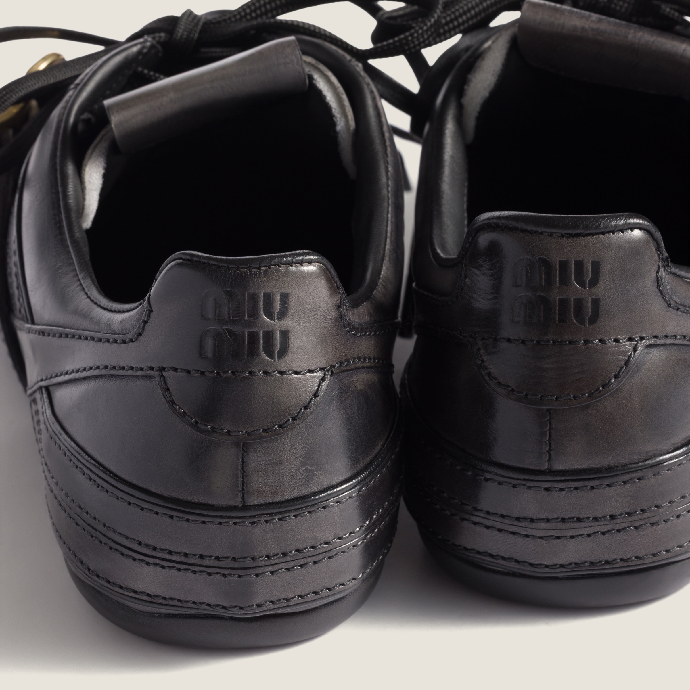 Black Leather Sneakers With Buckle | Miu Miu
