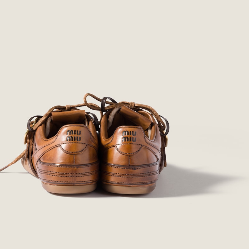 Leather sneakers with buckle