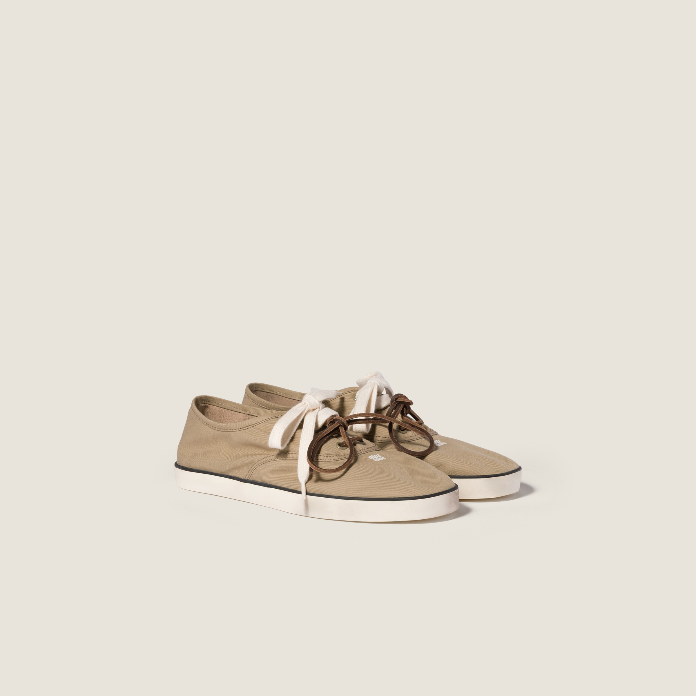 Chino sneakers from Miu Miu - $895
