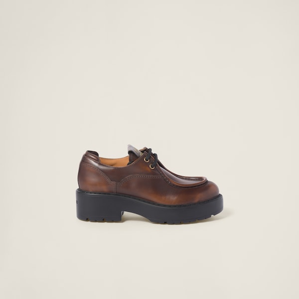 MIUMIU 26S LACE-UP BROGUE LOAFERS IN BLACK PATENT CALFSKIN