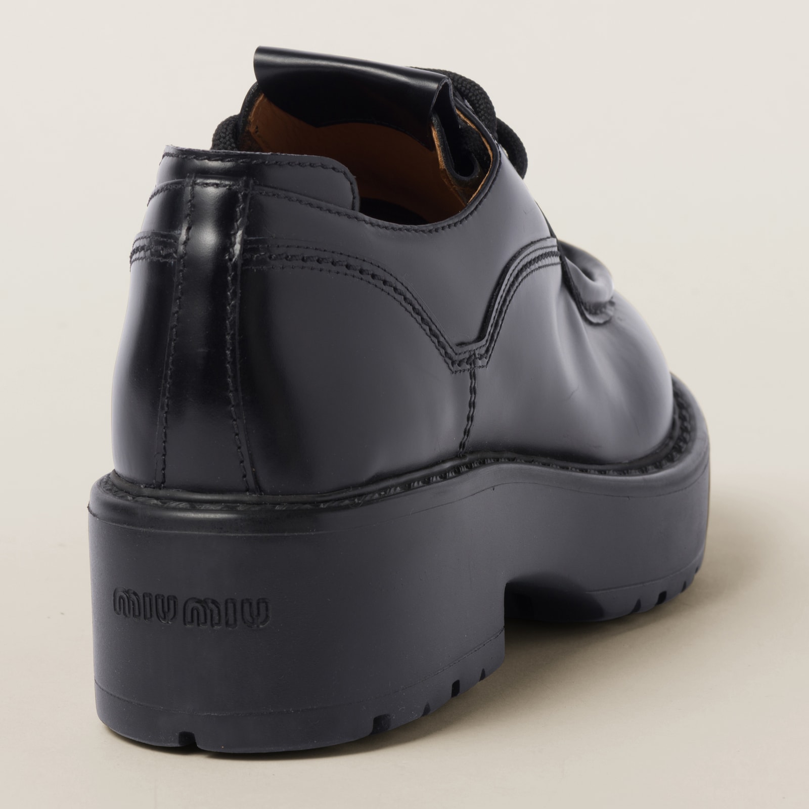 MIUMIU 26S LACED FUME SHOES IN BLACK CALFSKIN