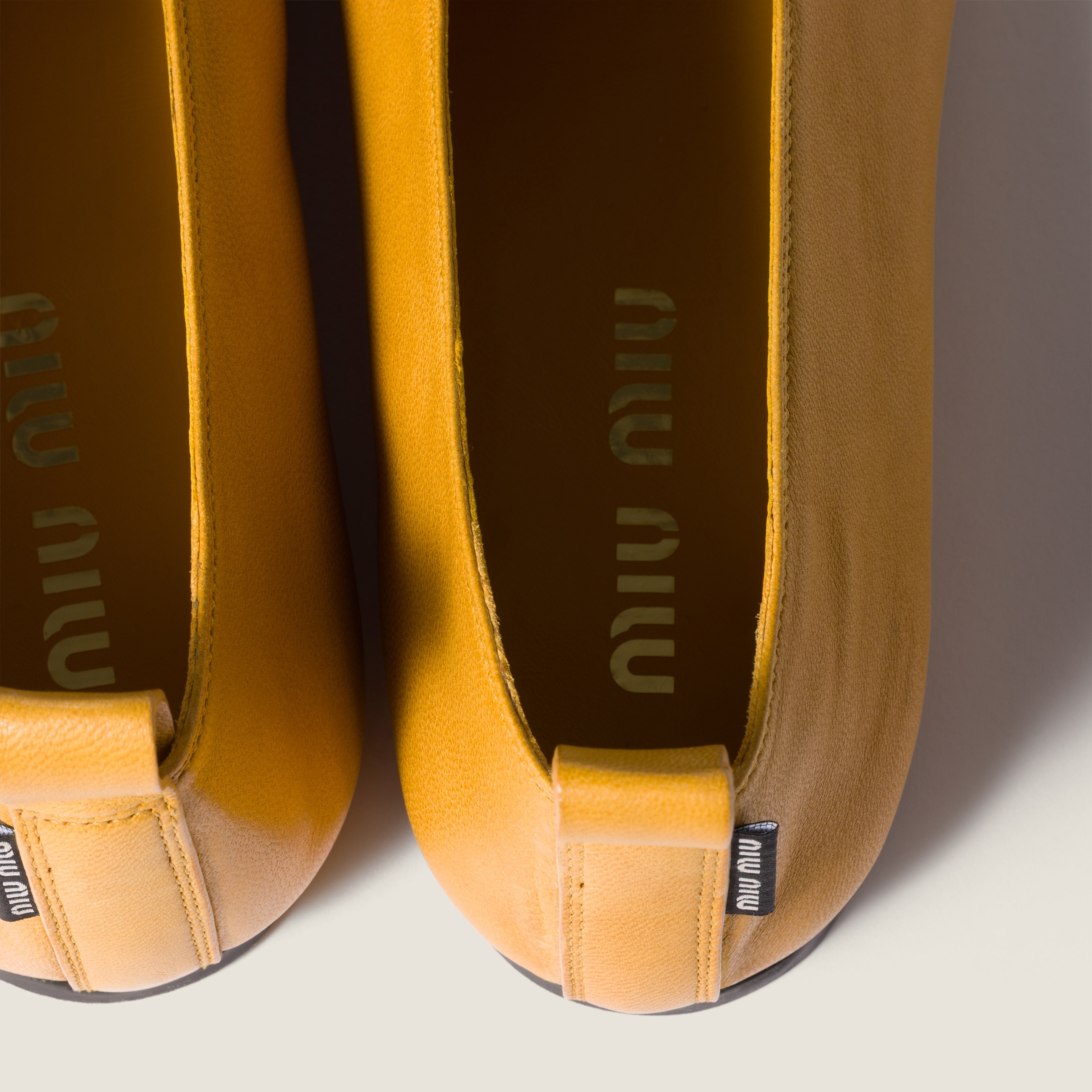 Miu Miu Élan Bow Leather Ballerina Flats In Yellow