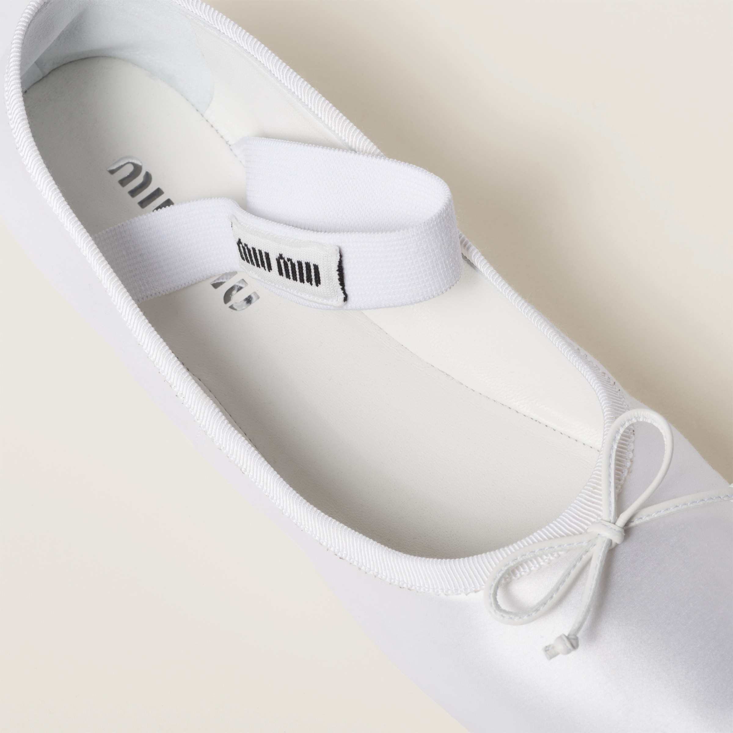 Shop Miumiu Satin Ballerinas In White