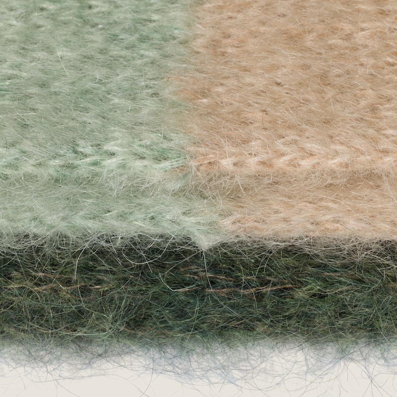 Bufanda de lana con flecos