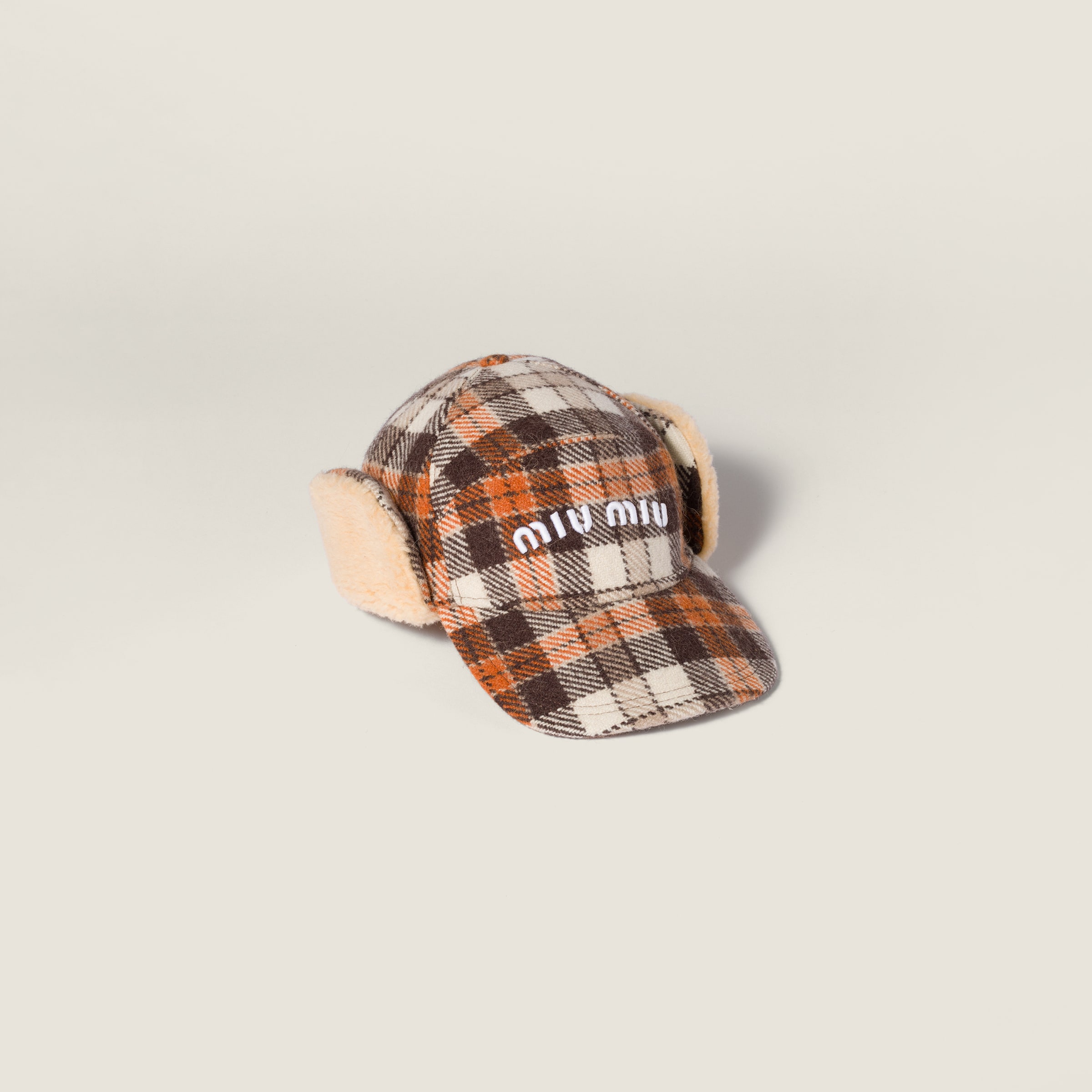 Plaid and plush fleece cap