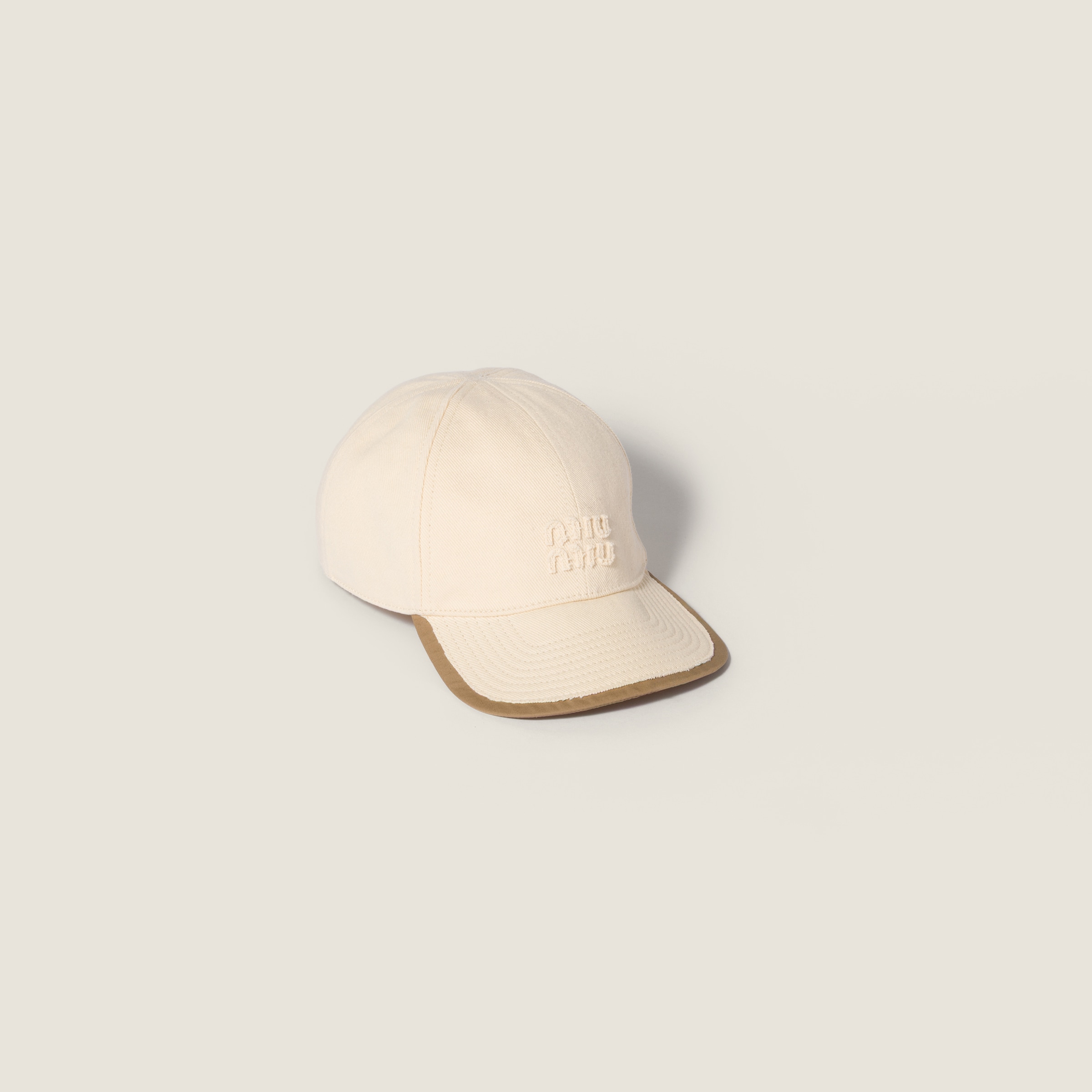 Drill and poplin baseball cap from Miu Miu - $695