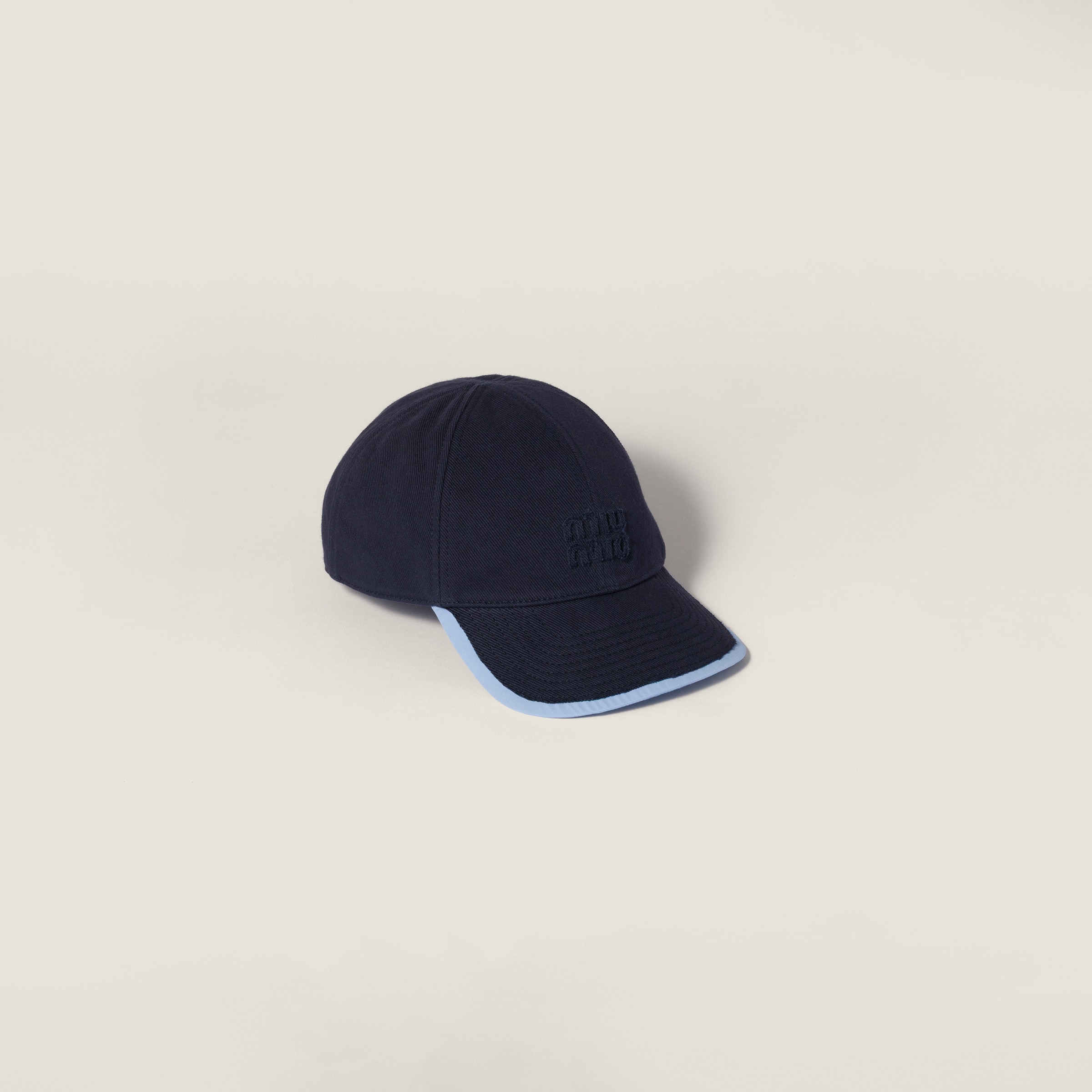 Drill and poplin baseball cap from Miu Miu - $695