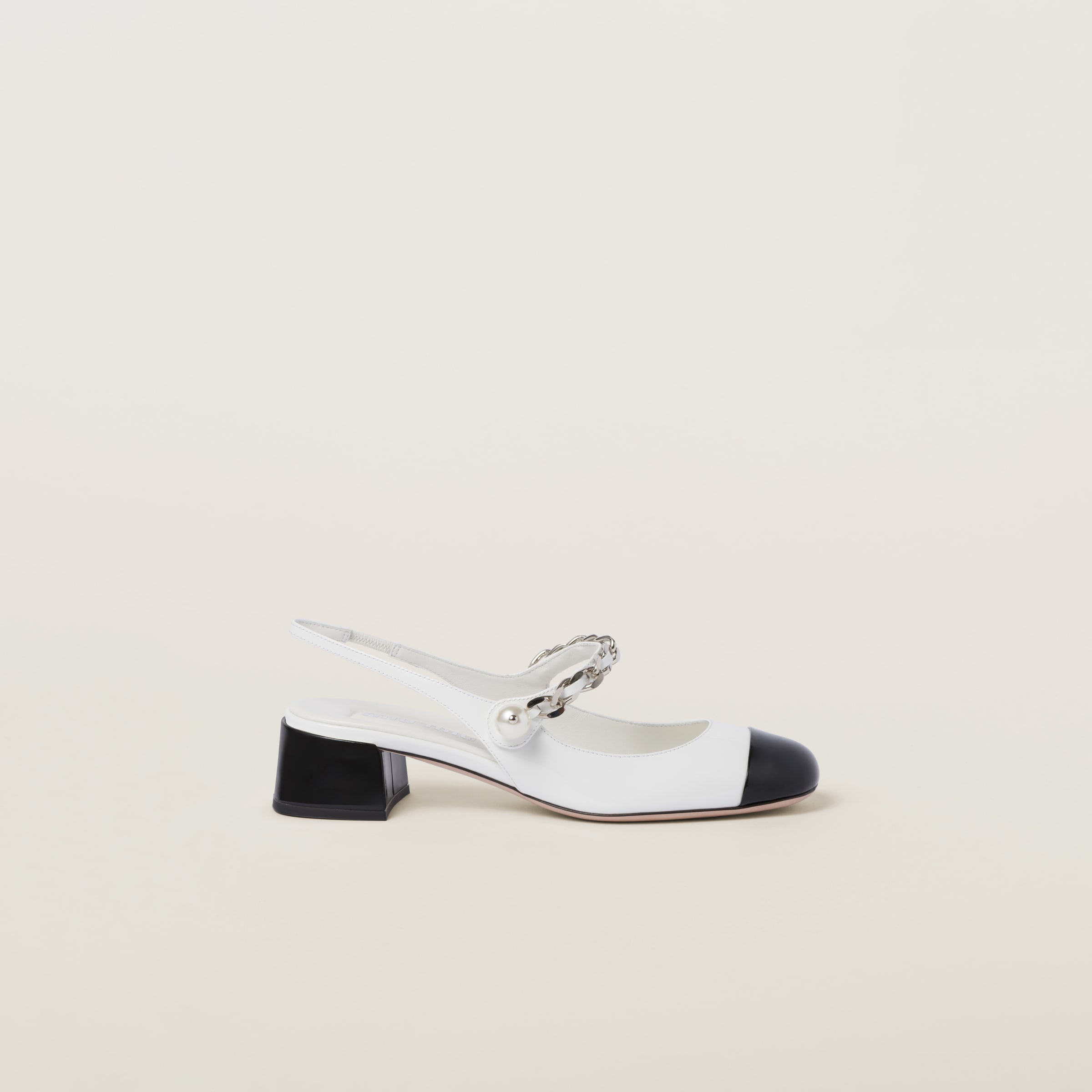 Shop Miumiu Two-tone Patent Leather Slingback Pumps In White/black