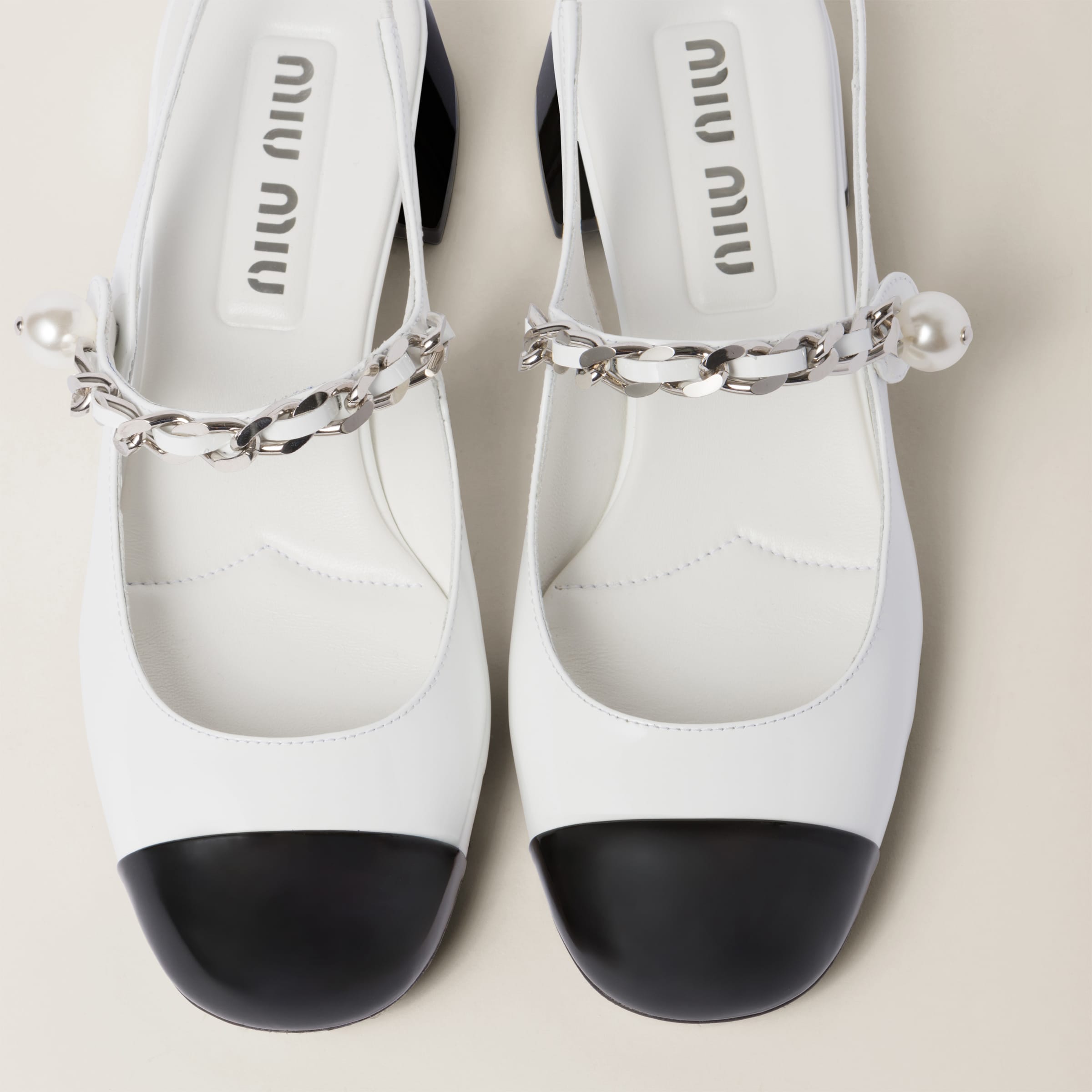 Shop Miumiu Two-tone Patent Leather Slingback Pumps In White/black