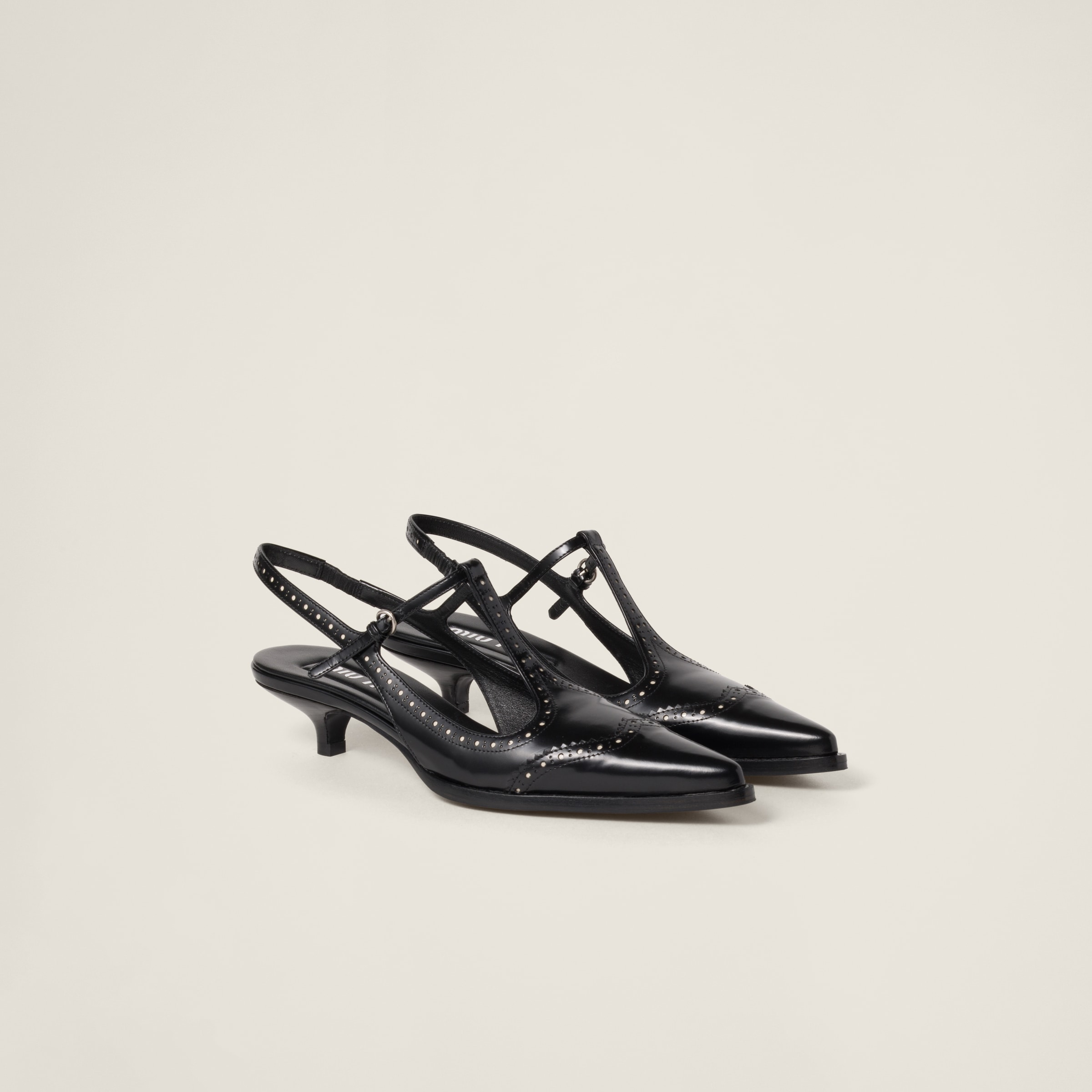 Miu Miu Leather Slingback Pumps In Black/ivory