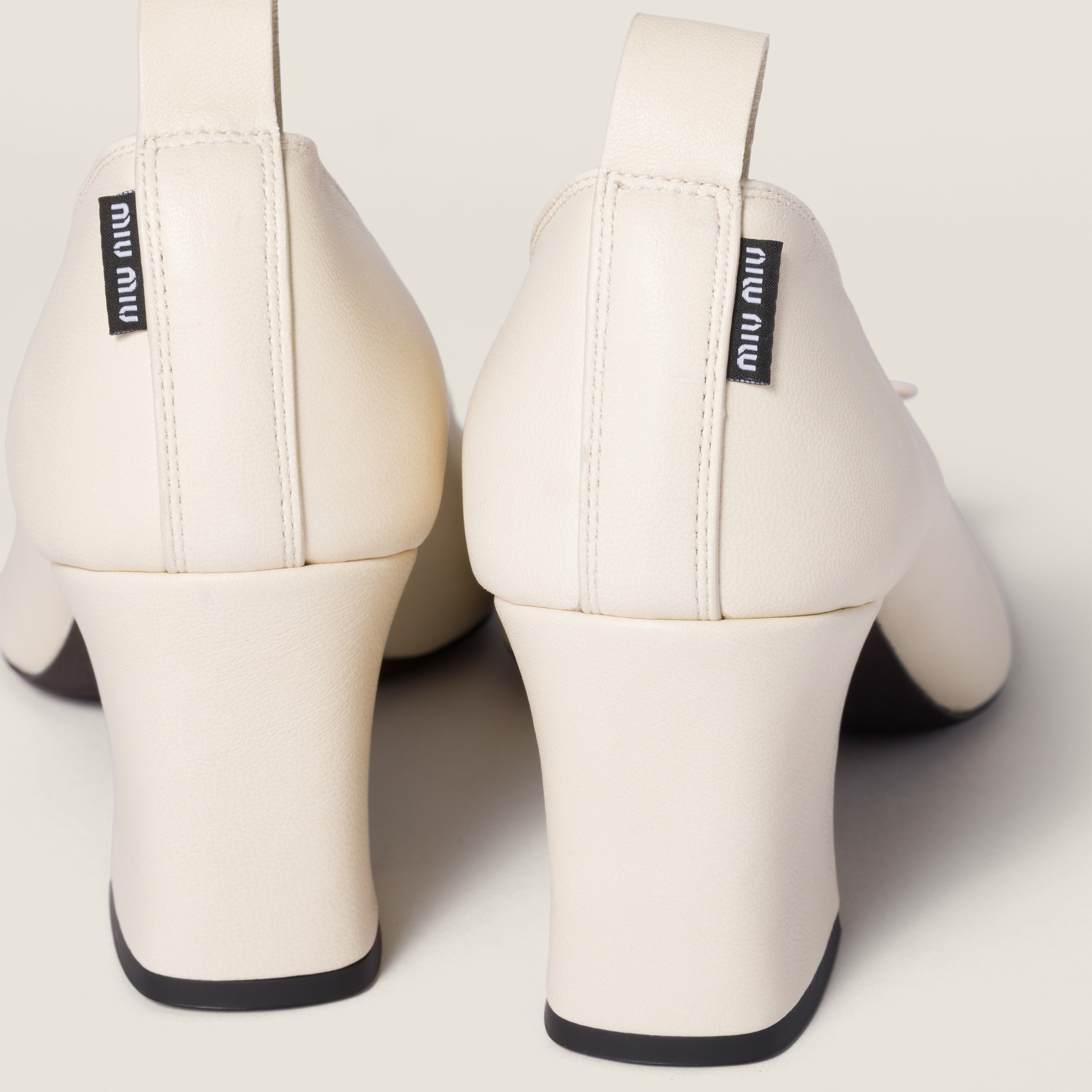 Ivory Élan Nappa Leather Pumps | Miu Miu