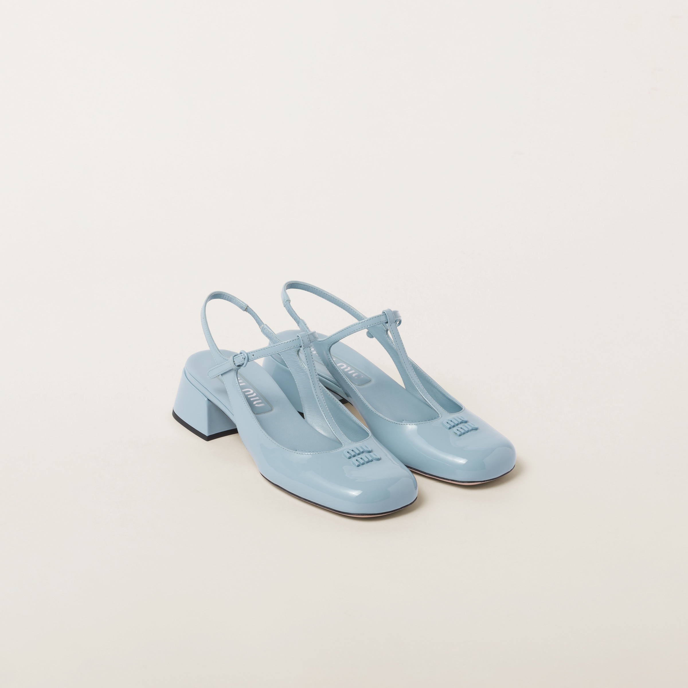 Décolleté slingback in vernice Azzurro | MIU MIU