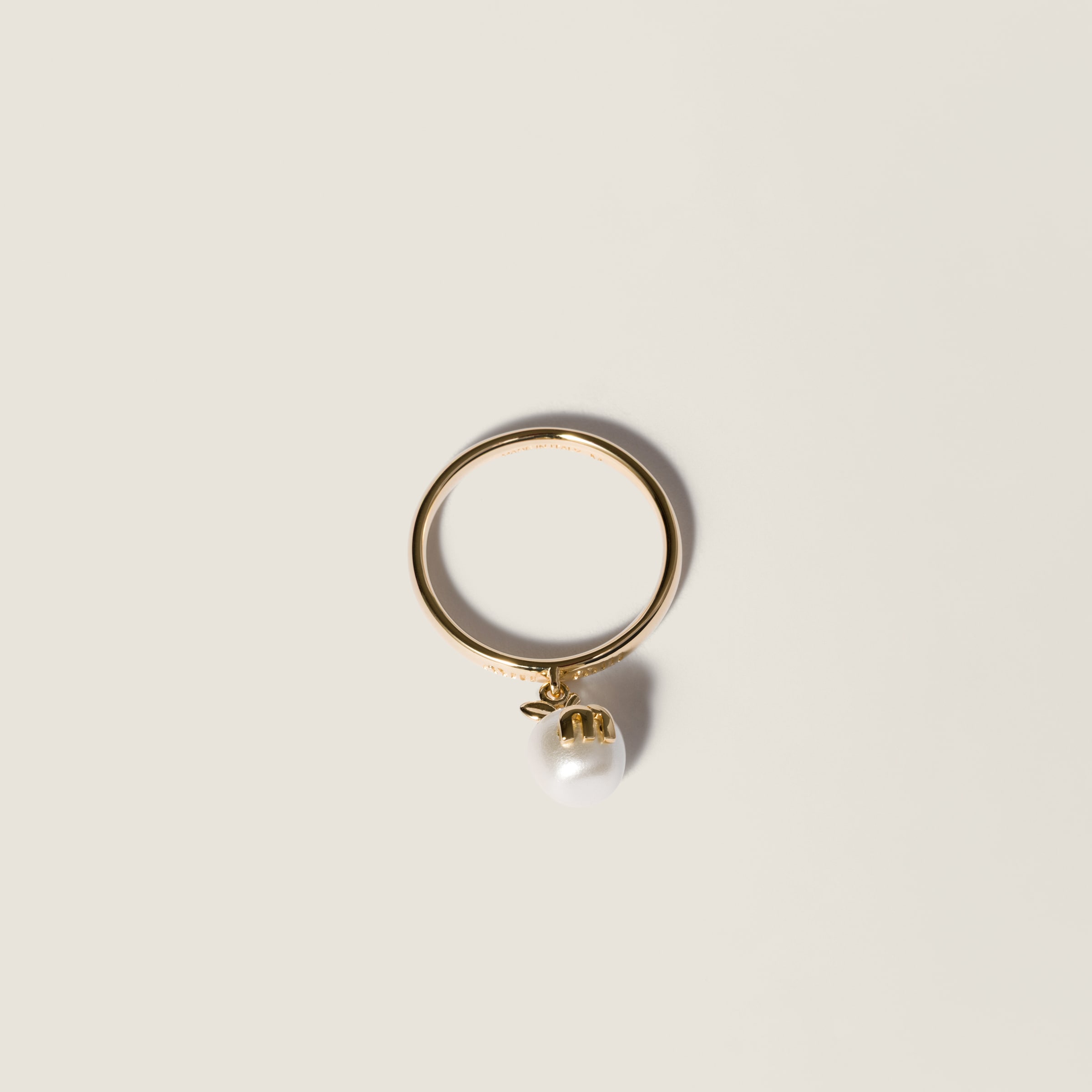 Metal ring with pendant from Miu Miu - $360