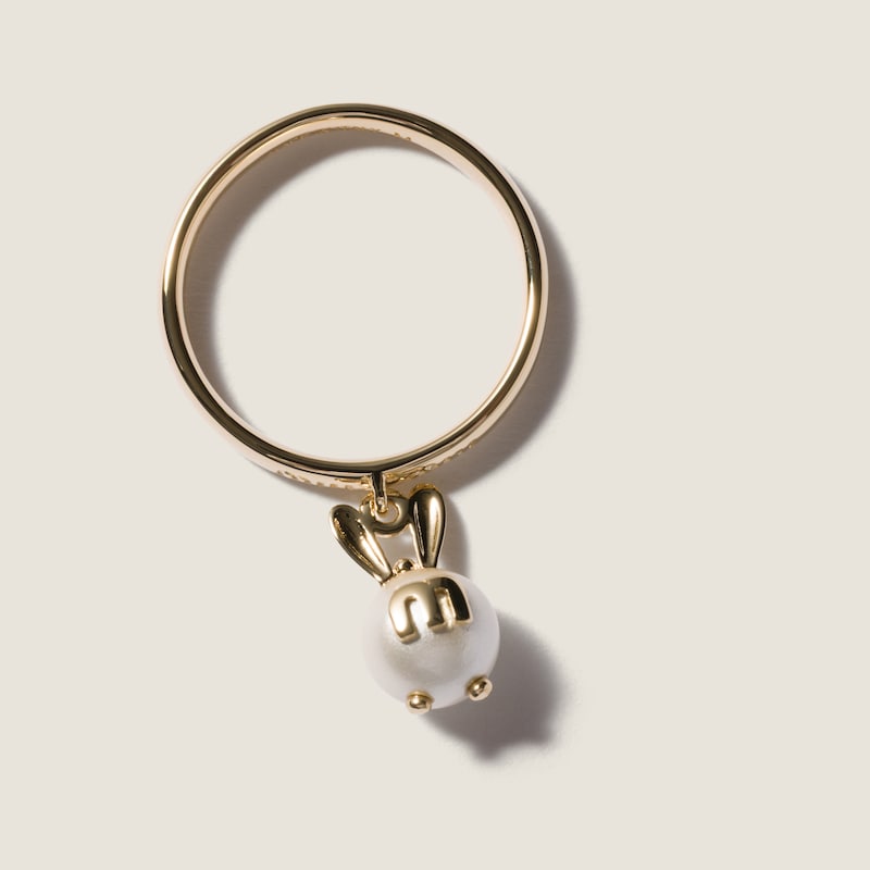 Metal ring with pendant