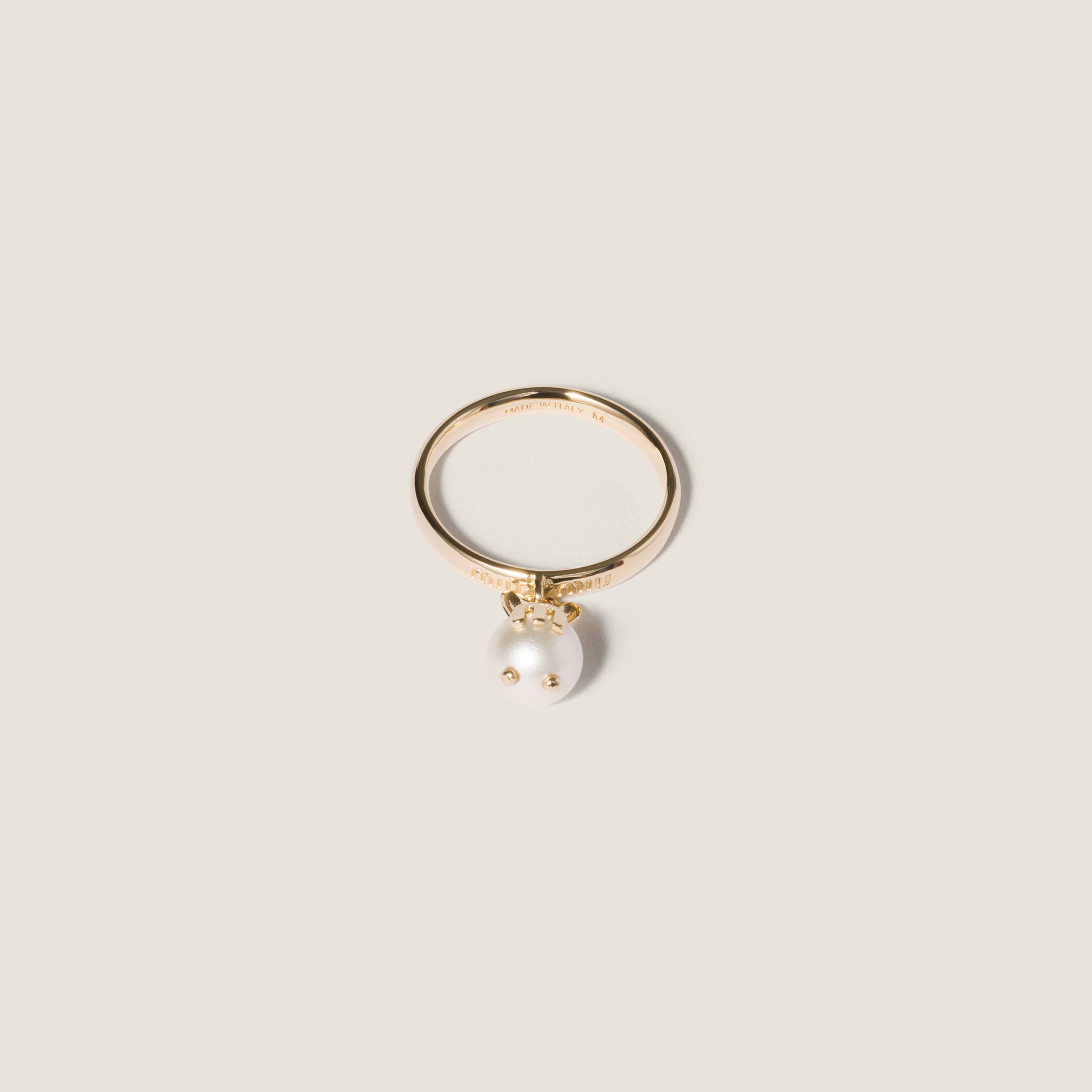 Metal ring with pendant from Miu Miu - $360