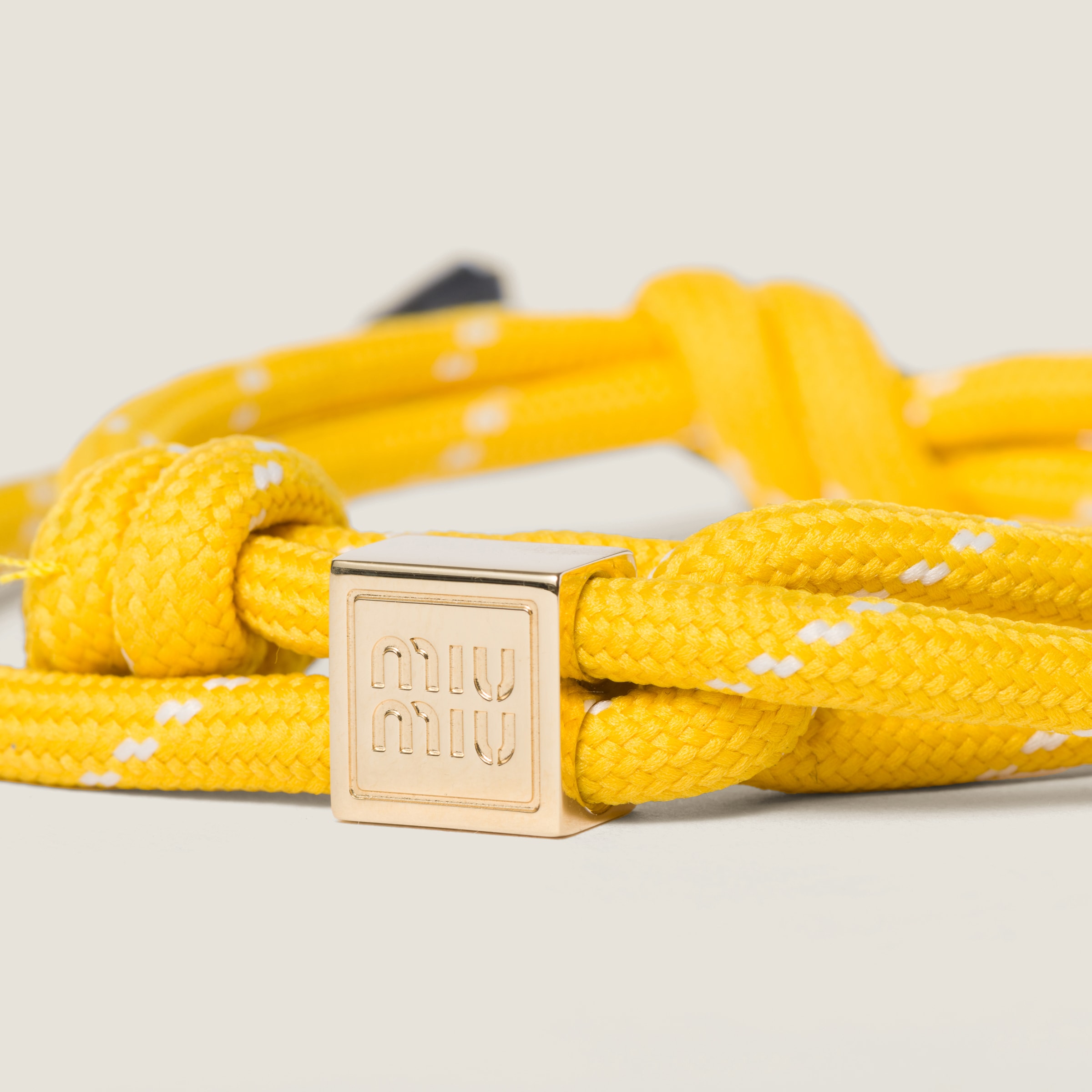 Shop Miumiu Cord And Nylon Bracelet In Yellow