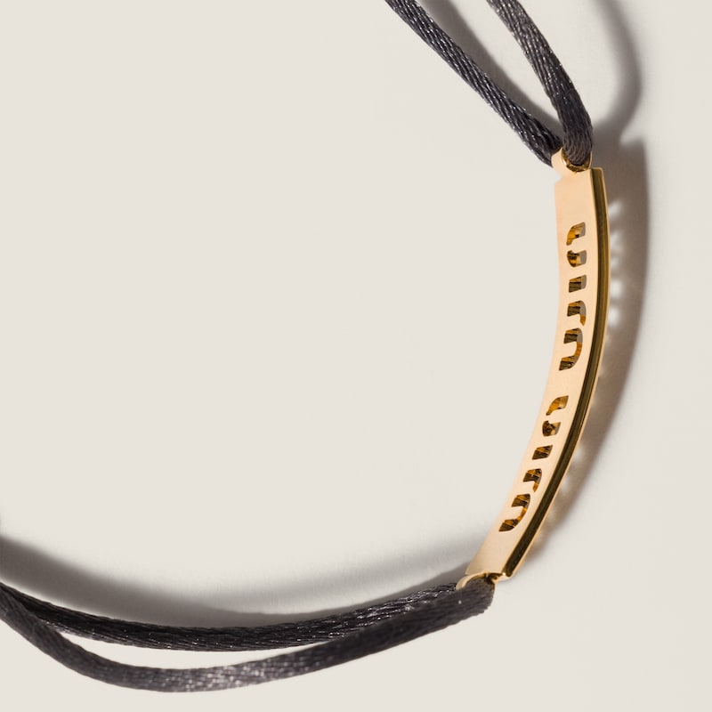 Metal and cord bracelet