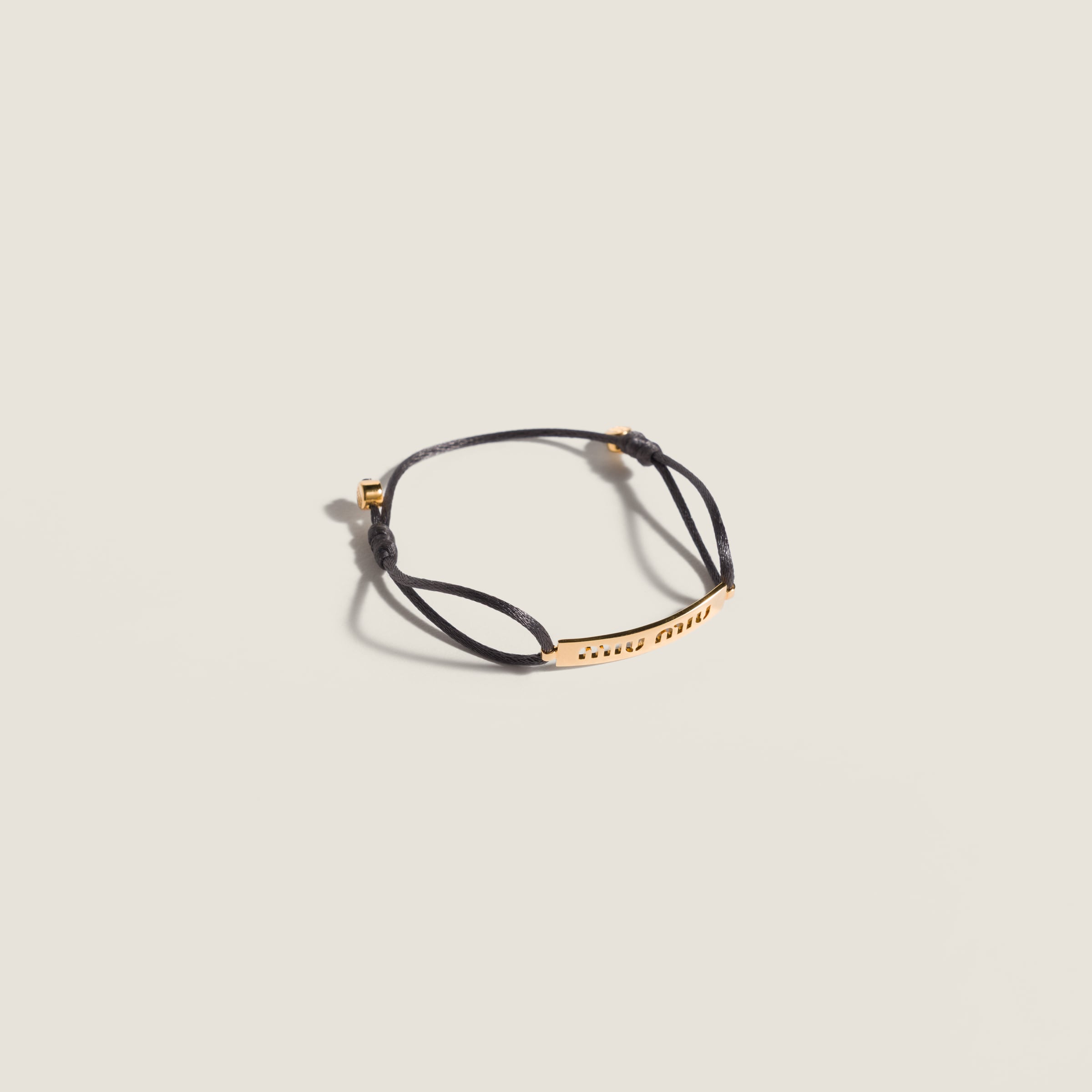 Metal and cord bracelet from Miu Miu - $340