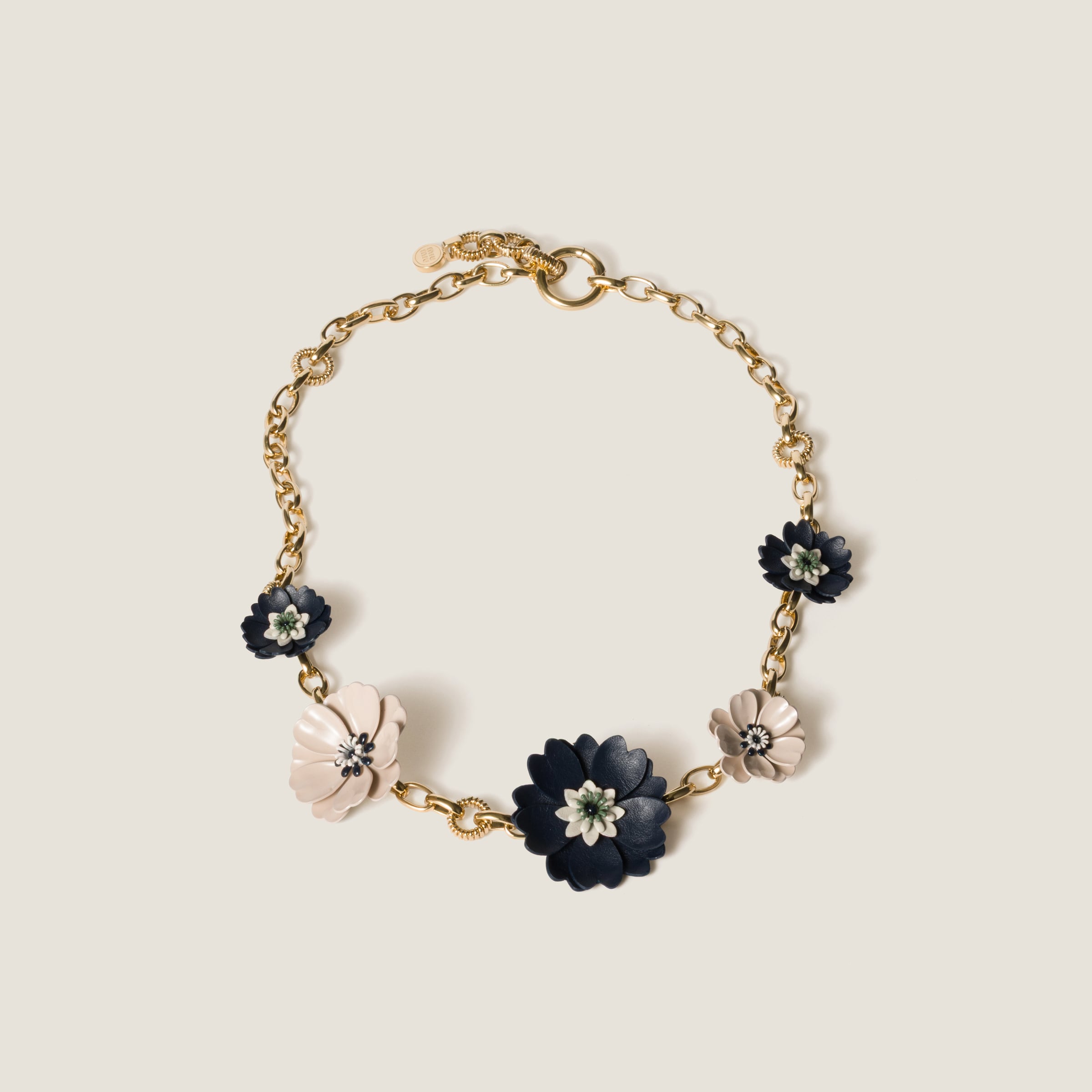 MiuMiu 金属と革 イヤリング ゴールド/オフホワイト 金属と革のイヤリング | Miu Miu