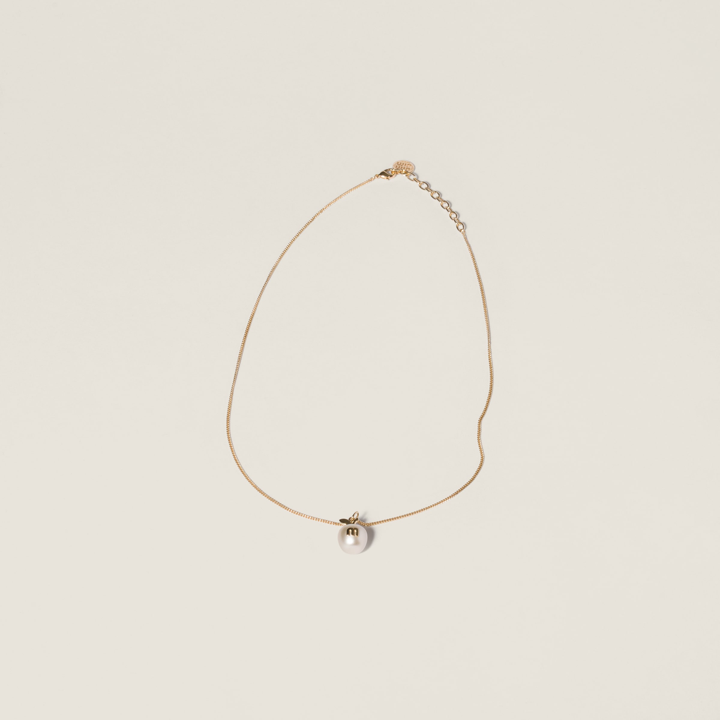 Metal necklace with pendant from Miu Miu - $650