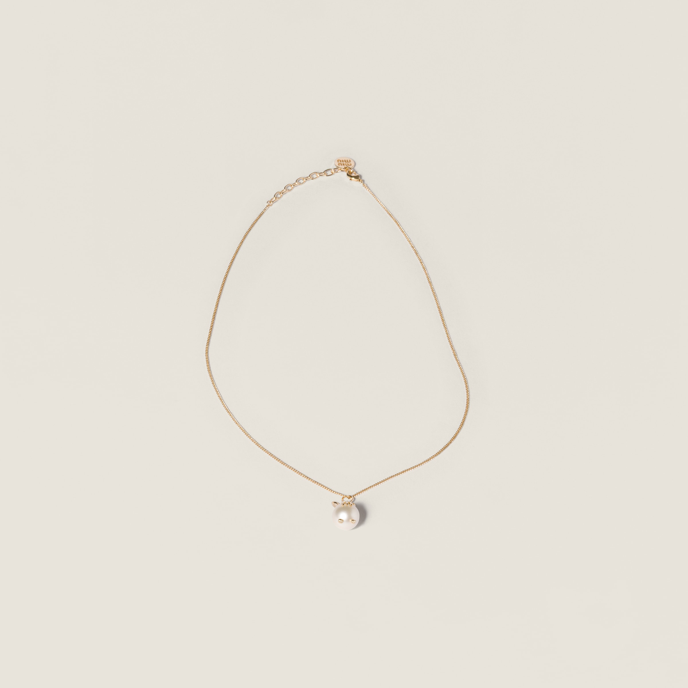 Metal necklace with pendant from Miu Miu - $650