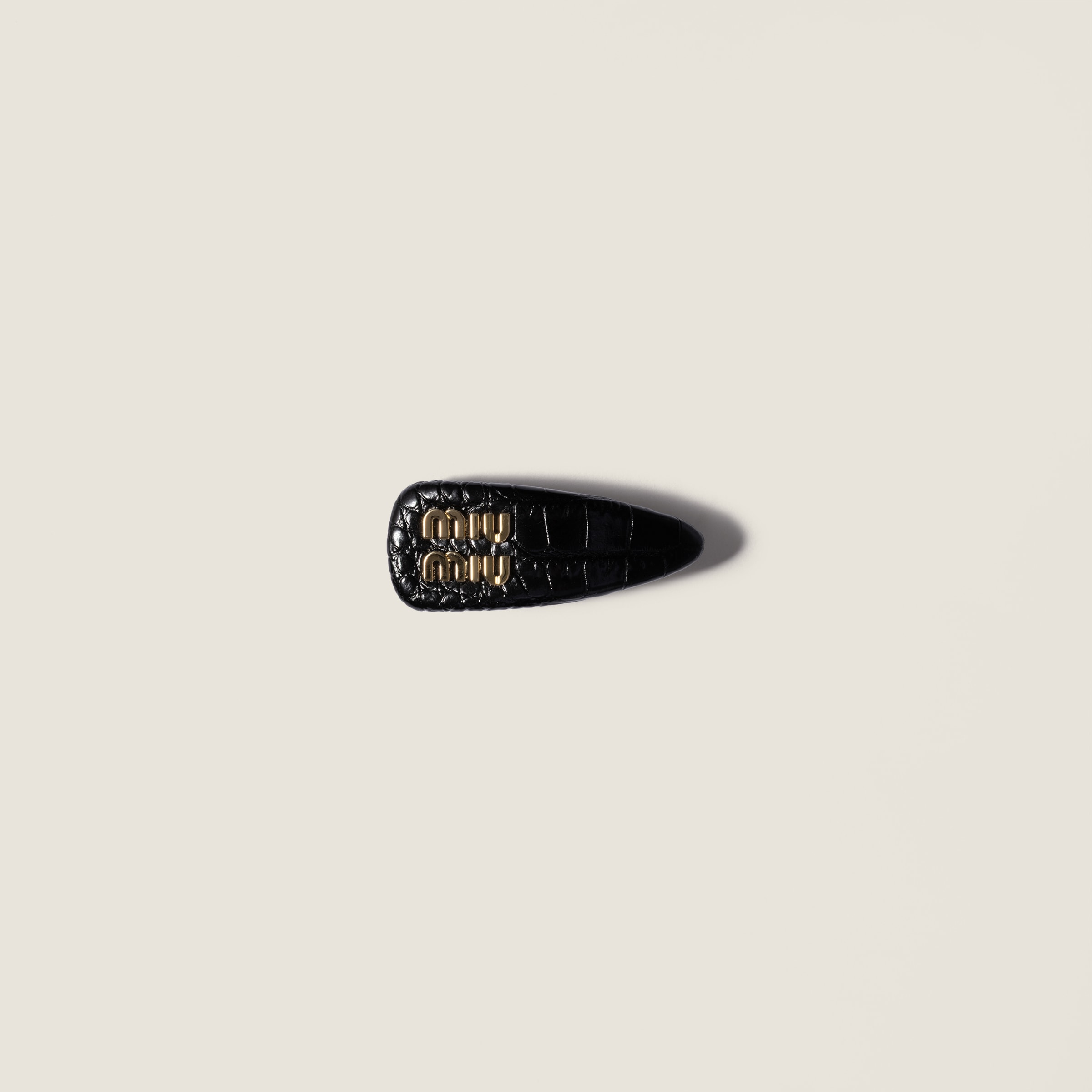 Crocodile embossed calfskin hair clip by Miu Miu