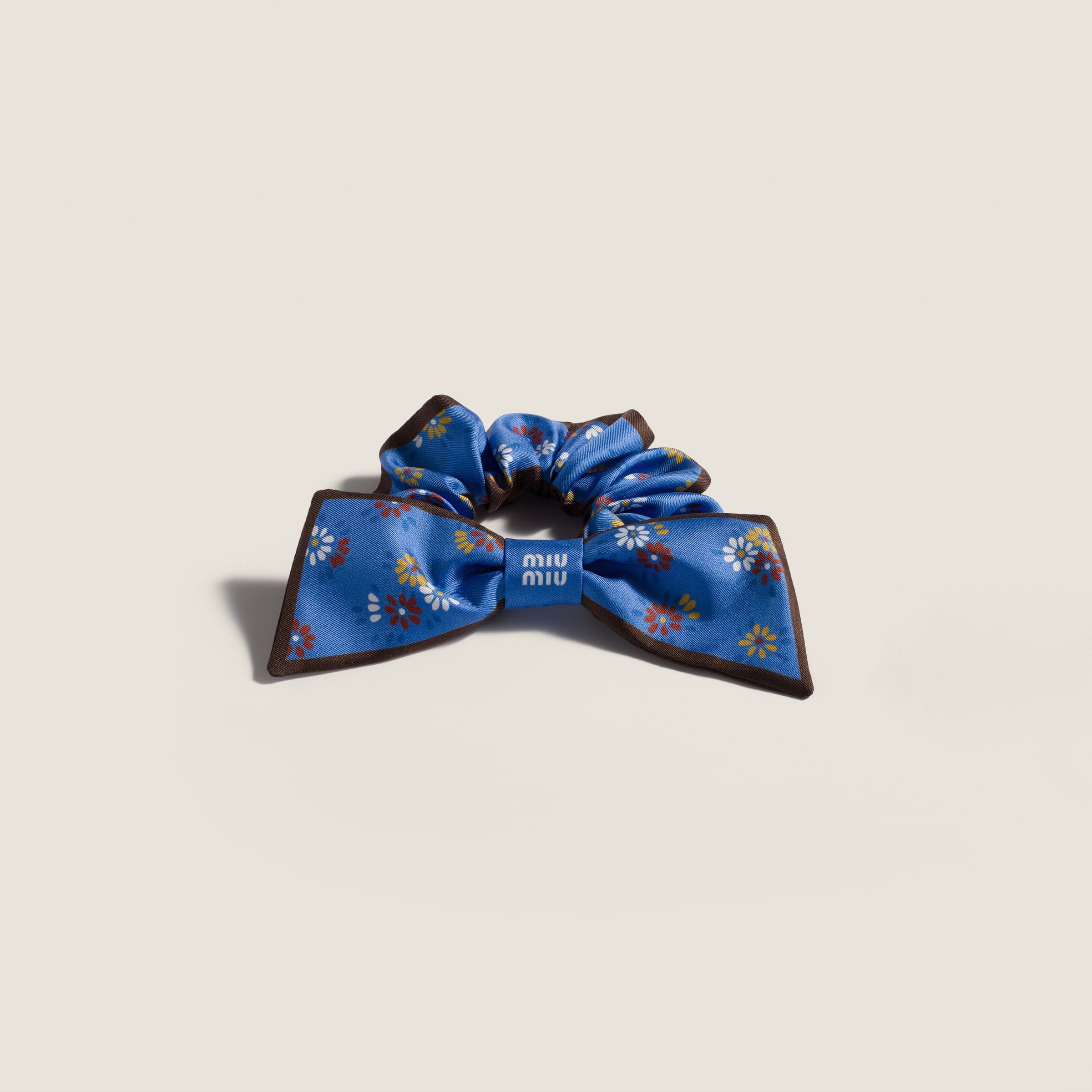 Twill scrunchie from Miu Miu - $420