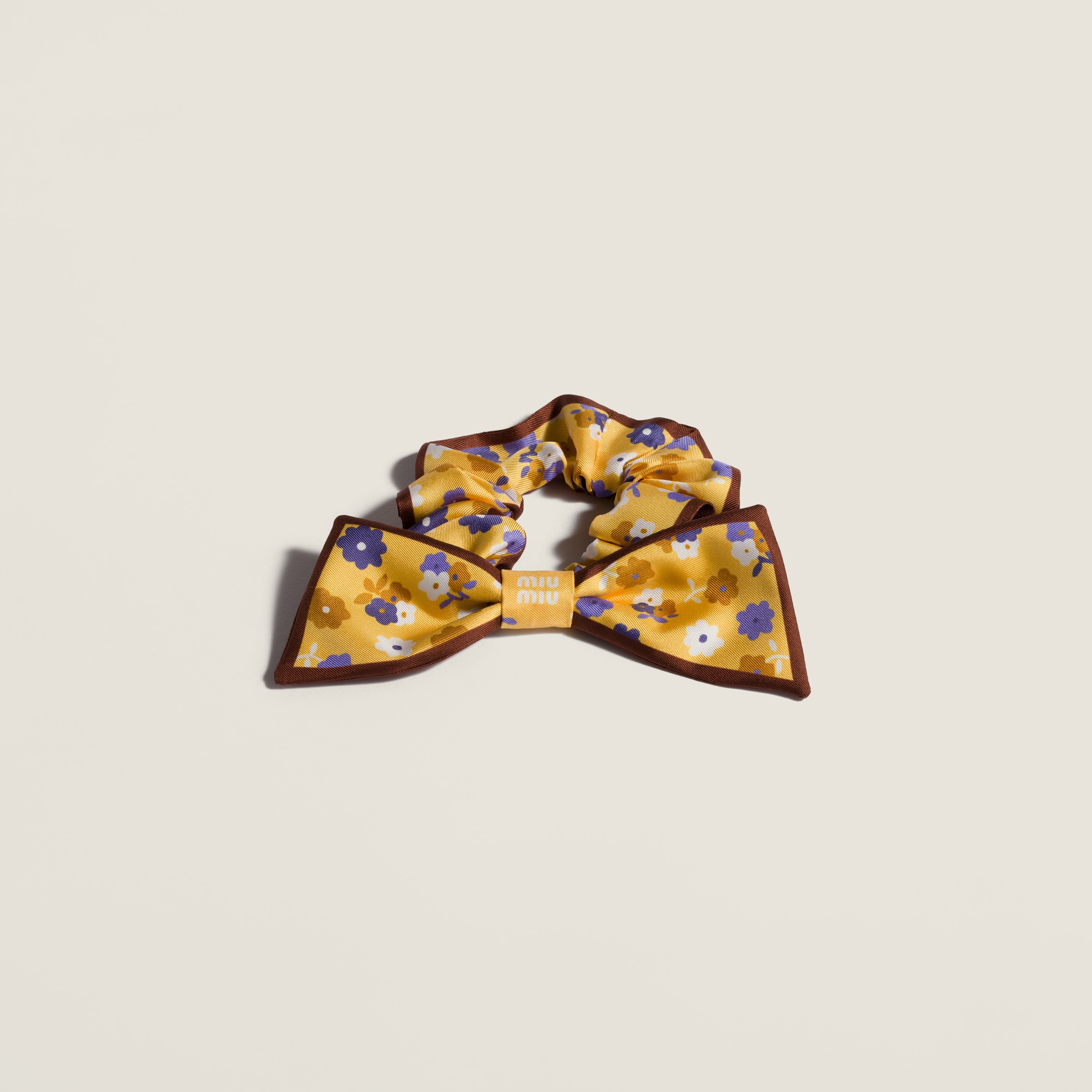 Twill scrunchie from Miu Miu - $420