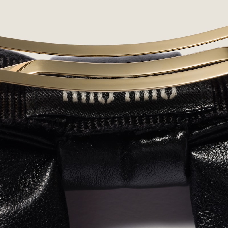 Leather bow hair clip