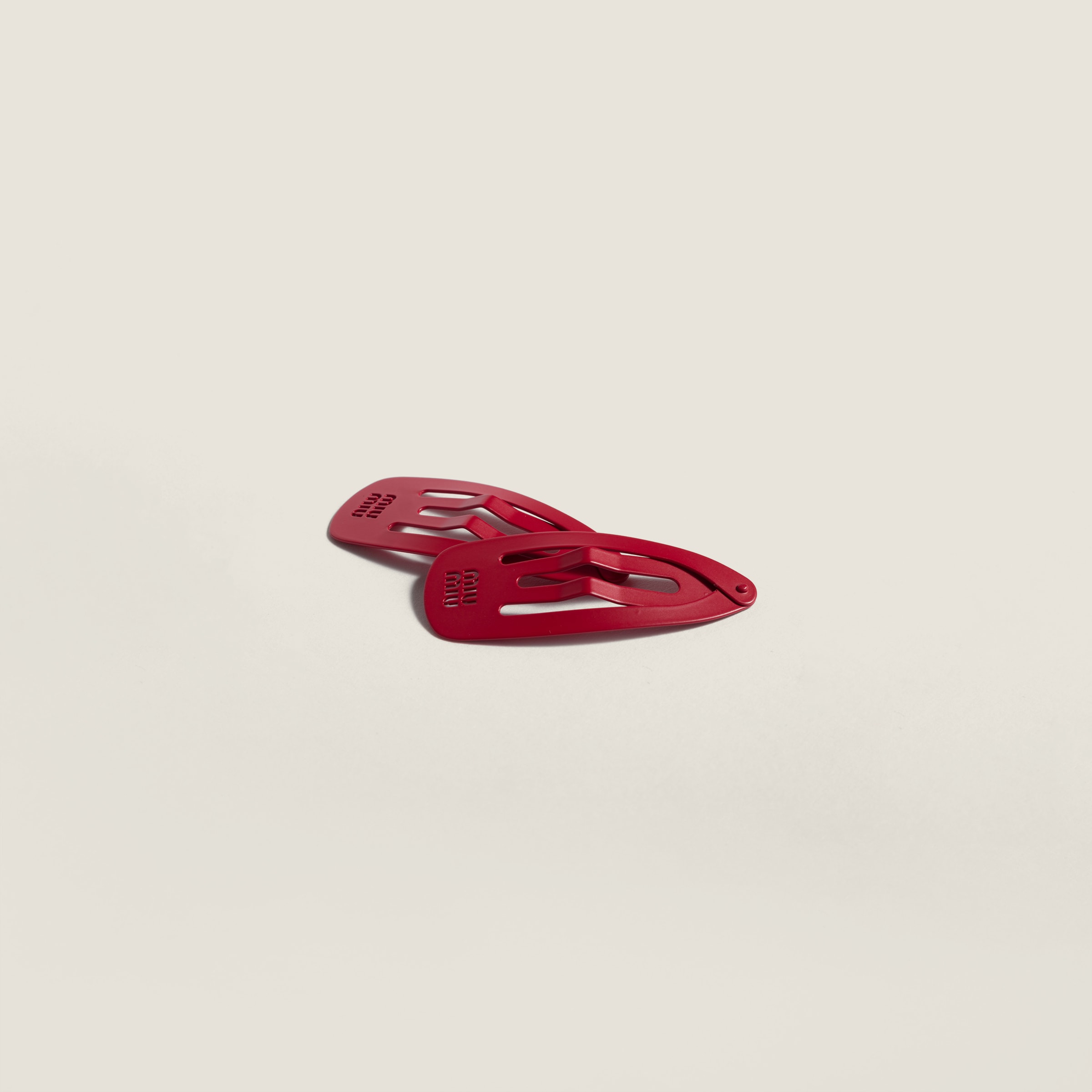 Metal hair clips from Miu Miu - $380