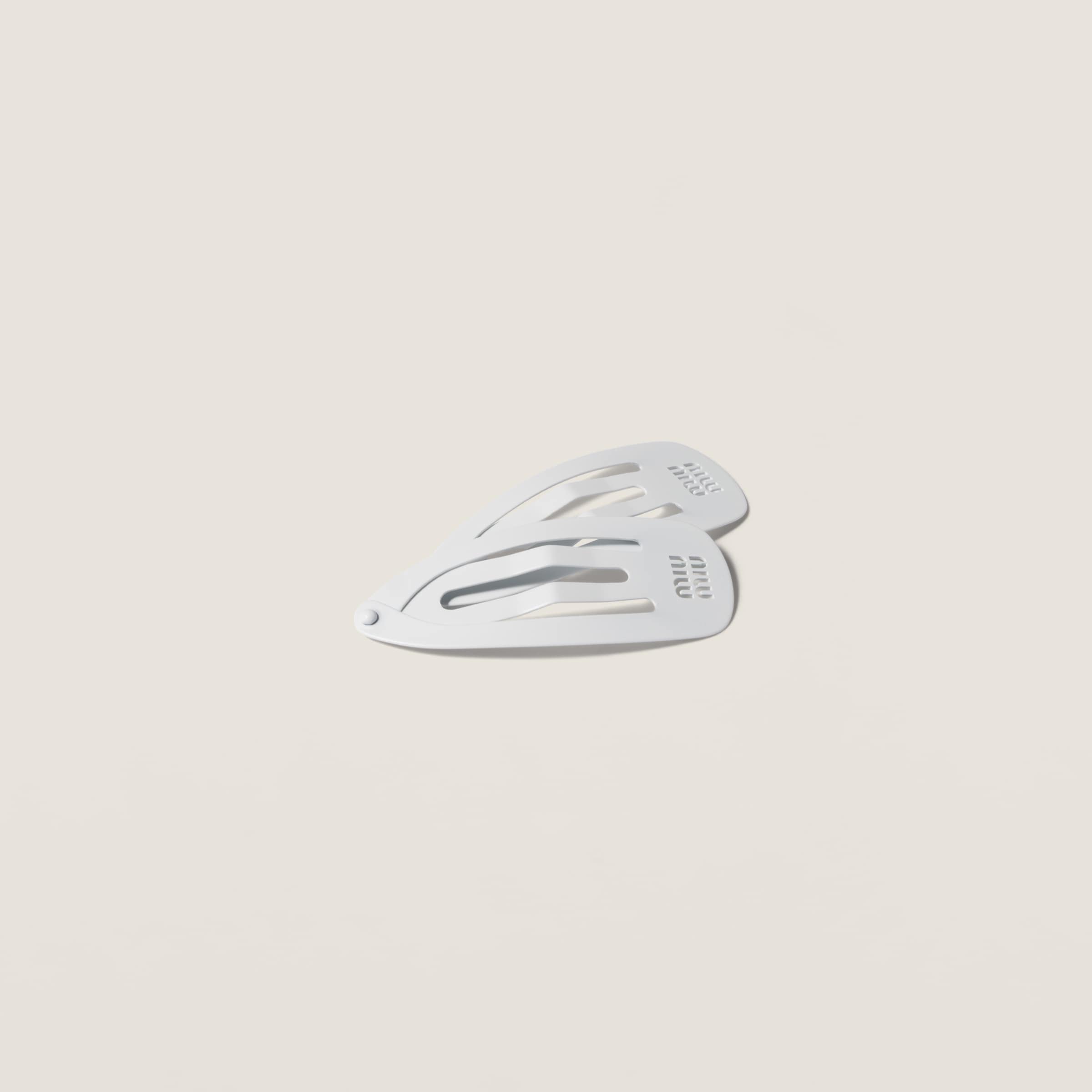 Metal hair clips from Miu Miu - $340