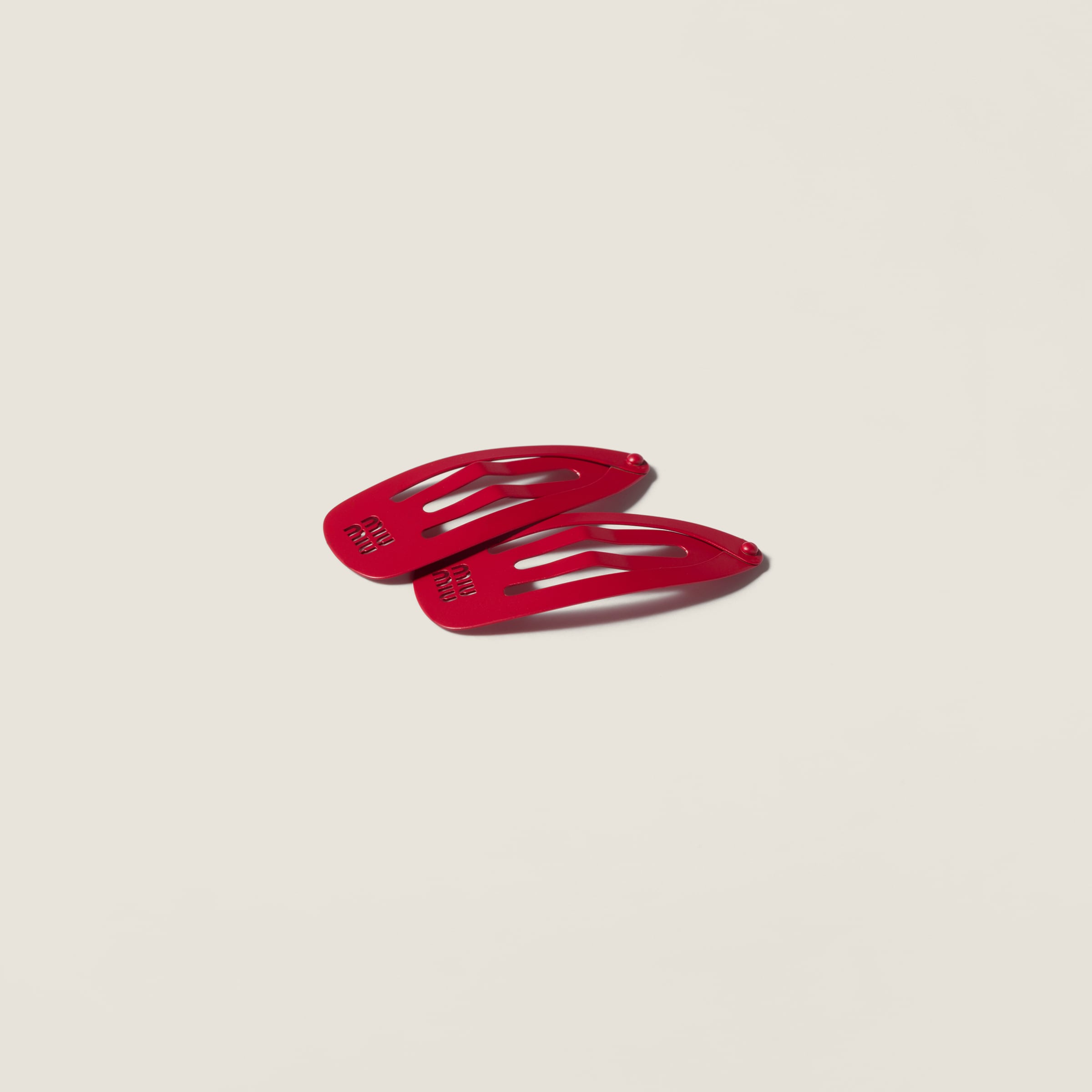 Metal hair clips from Miu Miu - $340