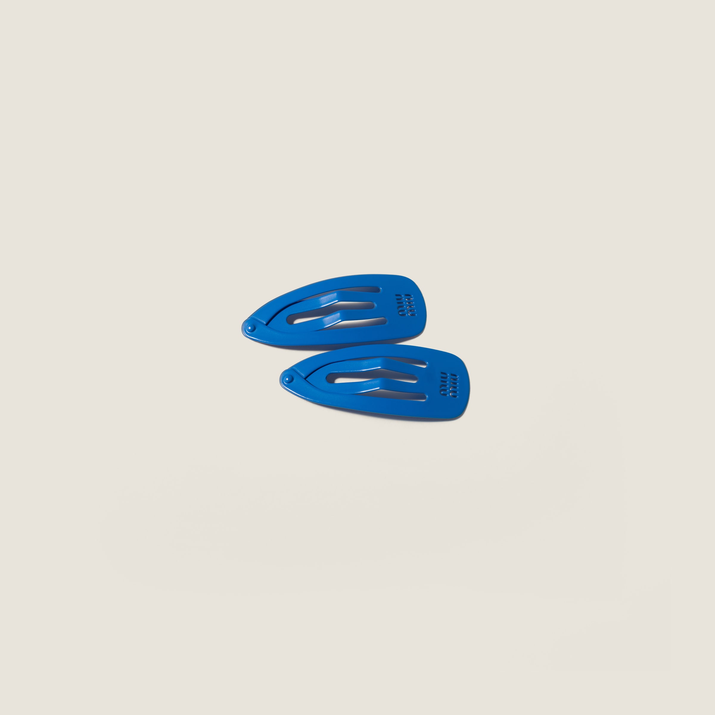 Metal hair clips from Miu Miu - $340