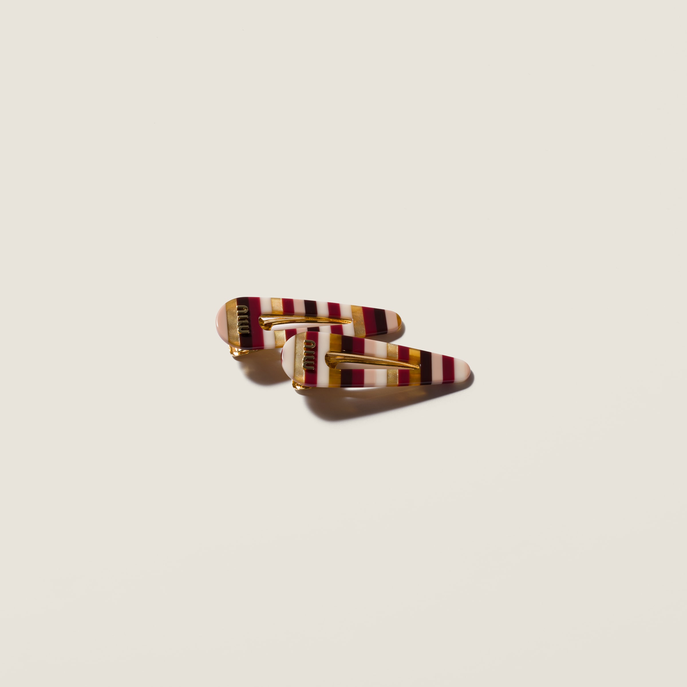 Hair clips with logo by Miu Miu