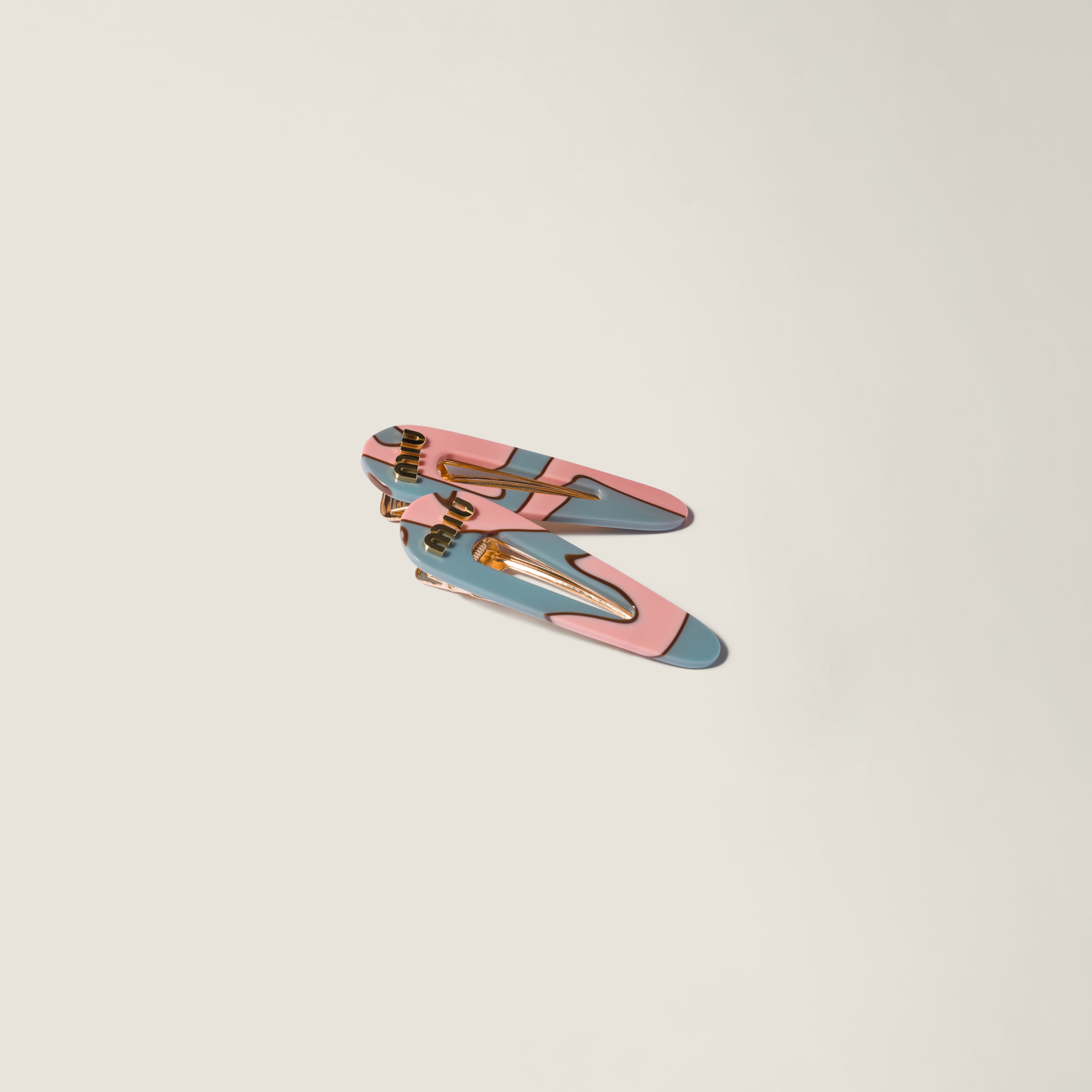 Hair clips with logo by Miu Miu