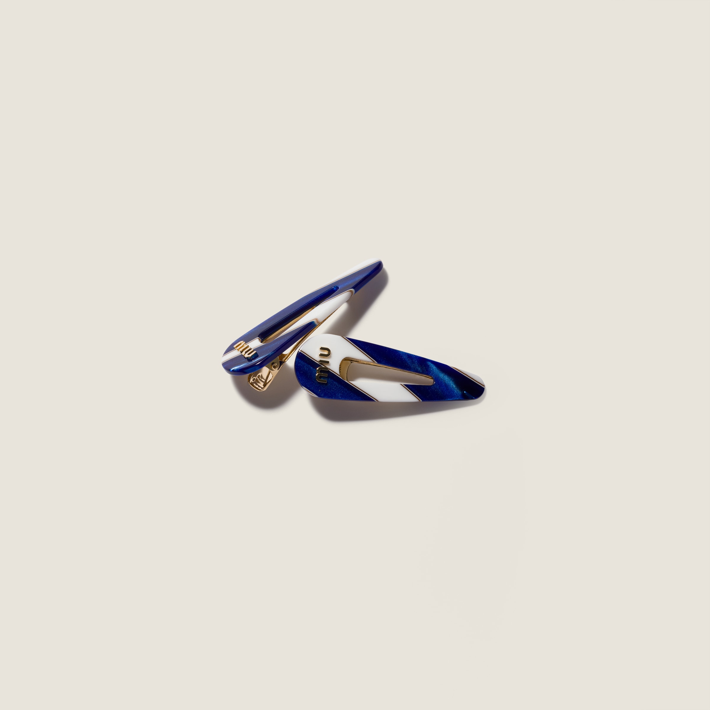 Hair clips with logo by Miu Miu