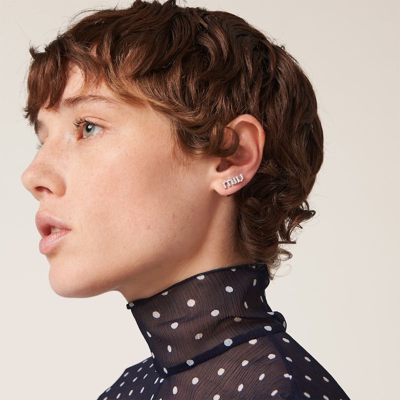 Metal earrings with crystals