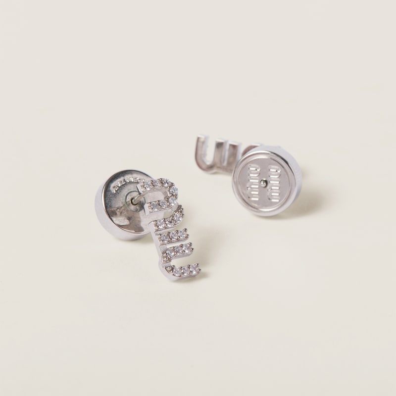 Metal earrings with crystals