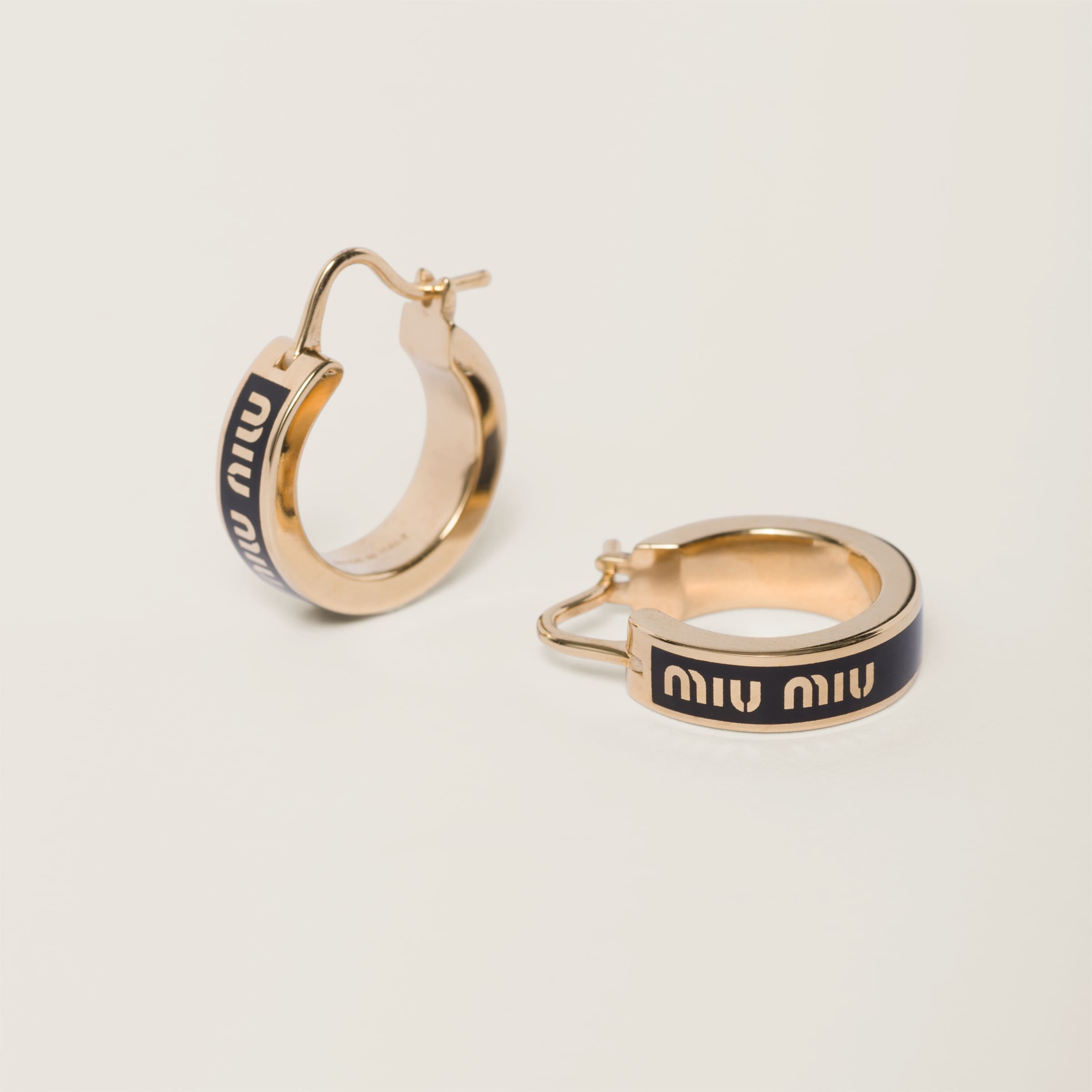 Shop Miumiu Enameled Metal Earrings In Black