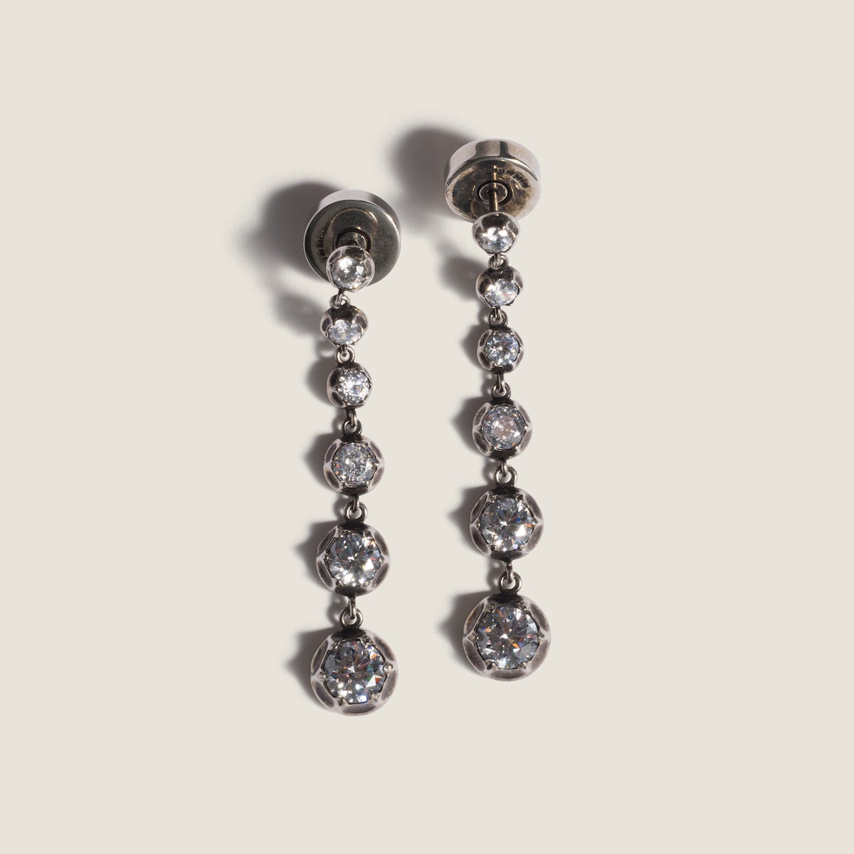 Metal pendant earrings with crystals