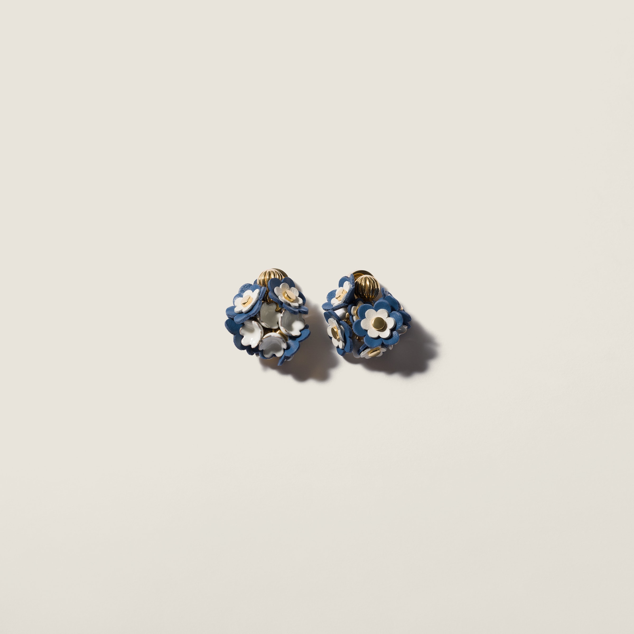 Metal and leather earrings from Miu Miu - $795
