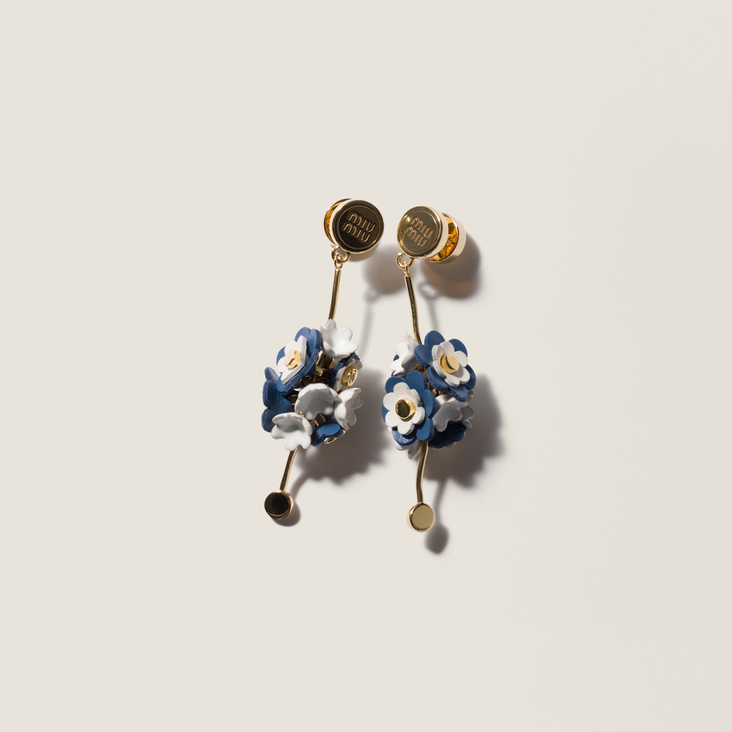 Metal and leather earrings from Miu Miu - $795