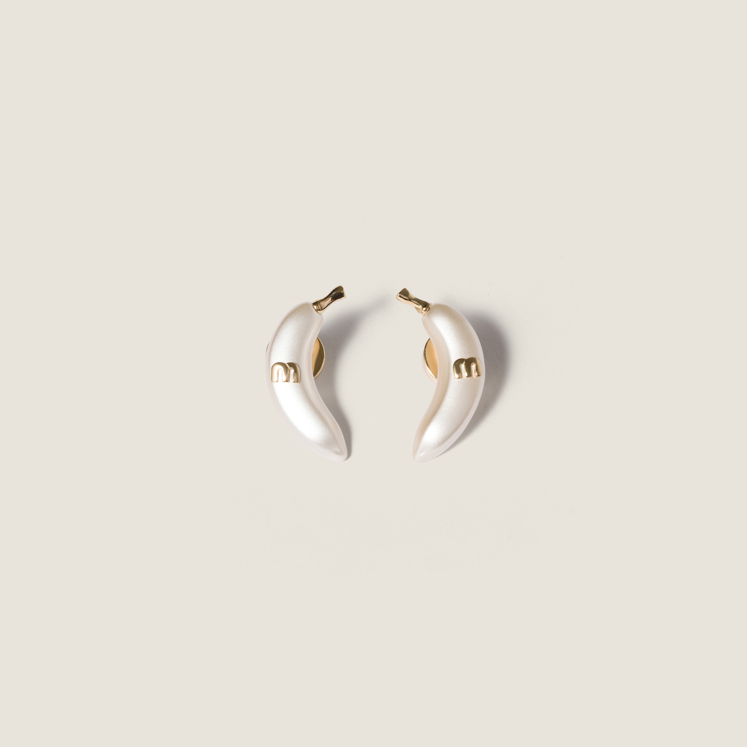 Metal earrings from Miu Miu - $525