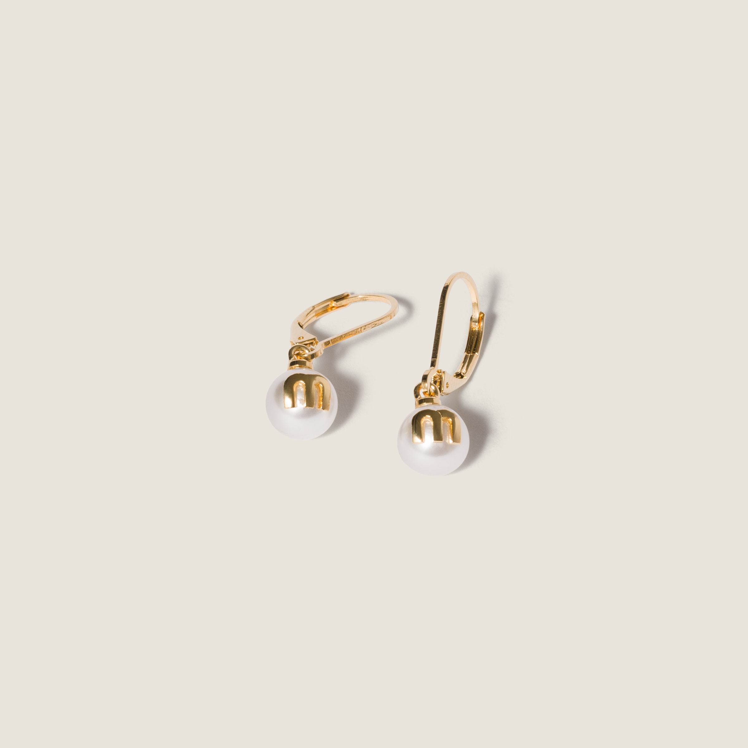 Metal earrings by Miu Miu