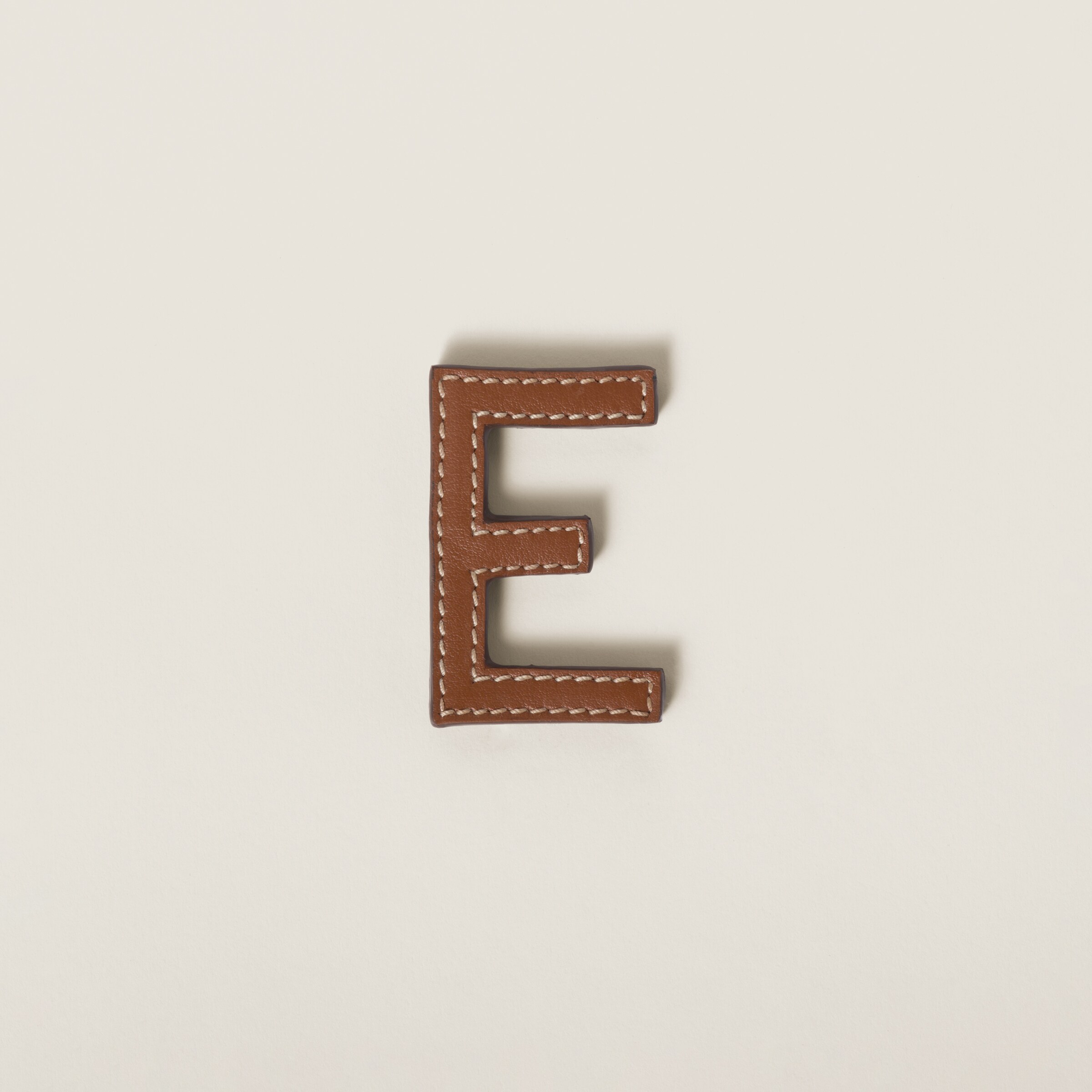 Miumiu Leather And Metal Brooch In Brown