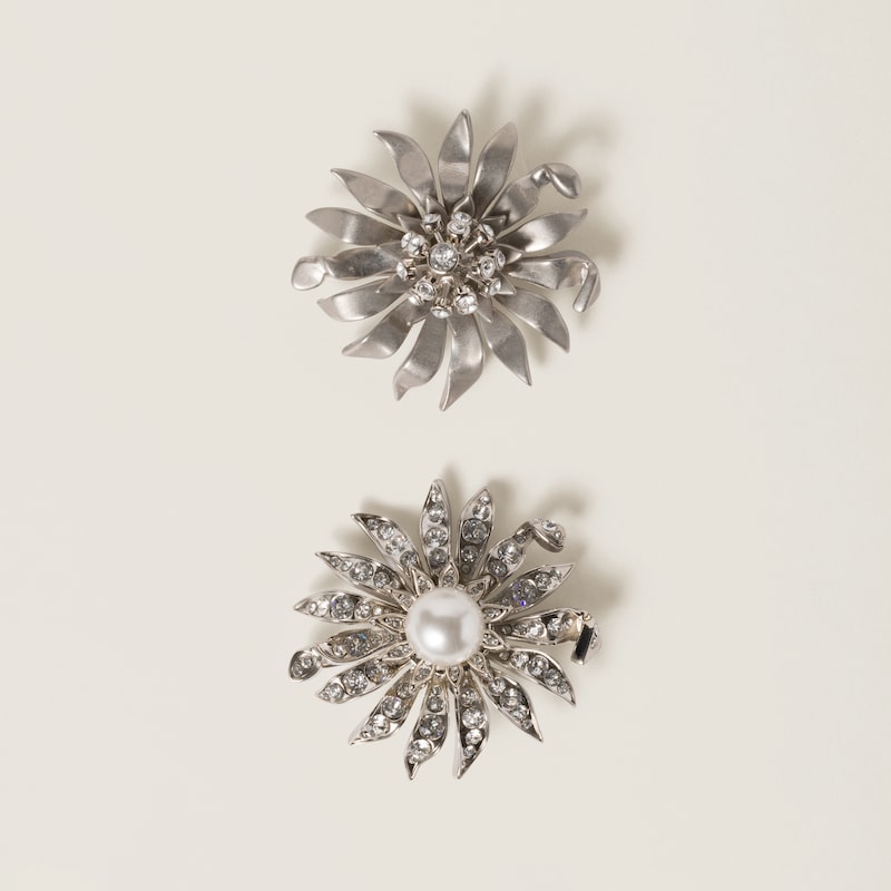 Metal brooches with crystals and pearl